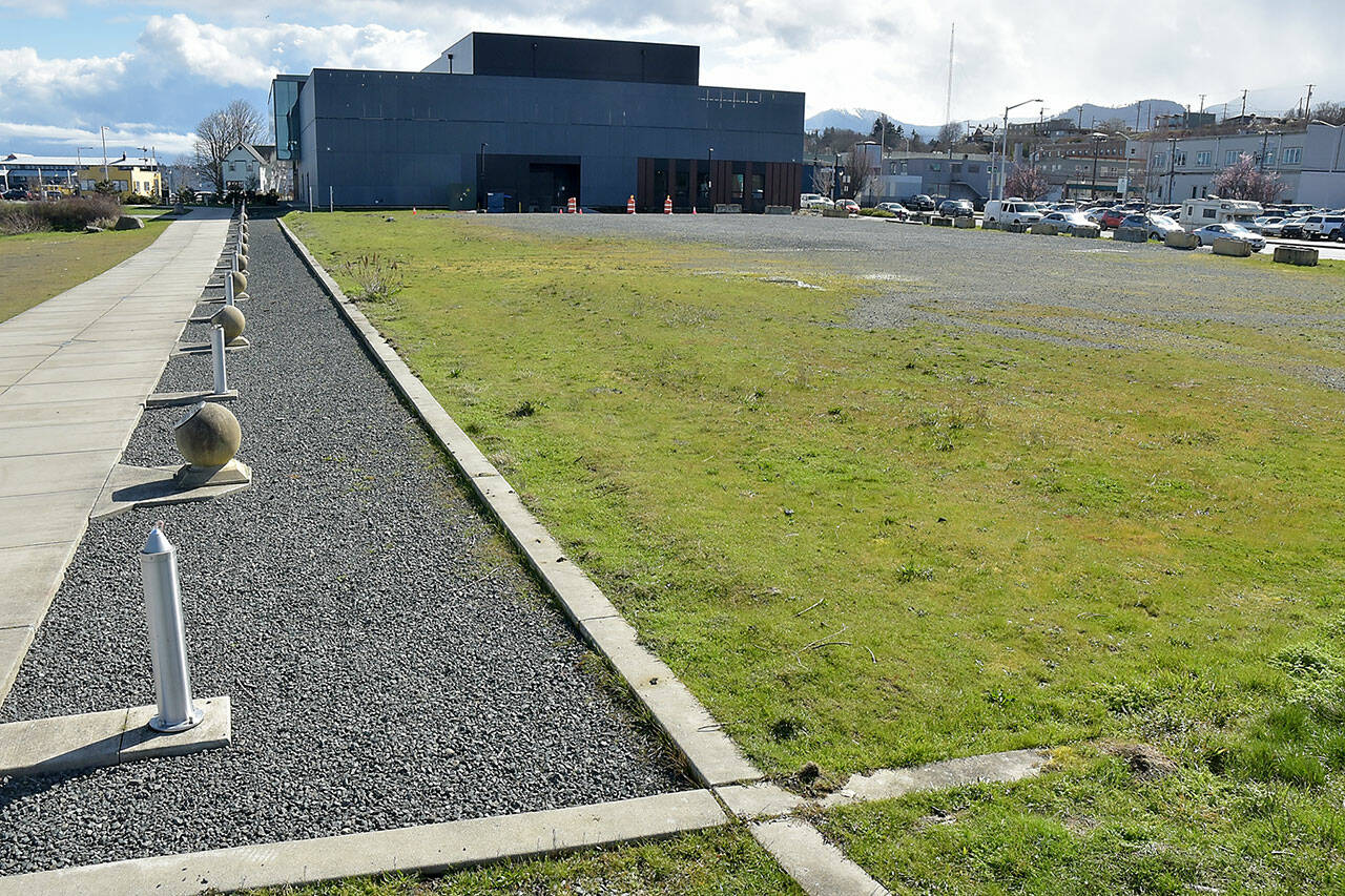 A currently undeveloped area next to the Field Arts & Events Hall will make up the rest of the Port Angeles Waterfront Center — the future home of the Marine Discovery Center and the Lower Elwha Klallam Cultural Center. (Keith Thorpe/Peninsula Daily News)