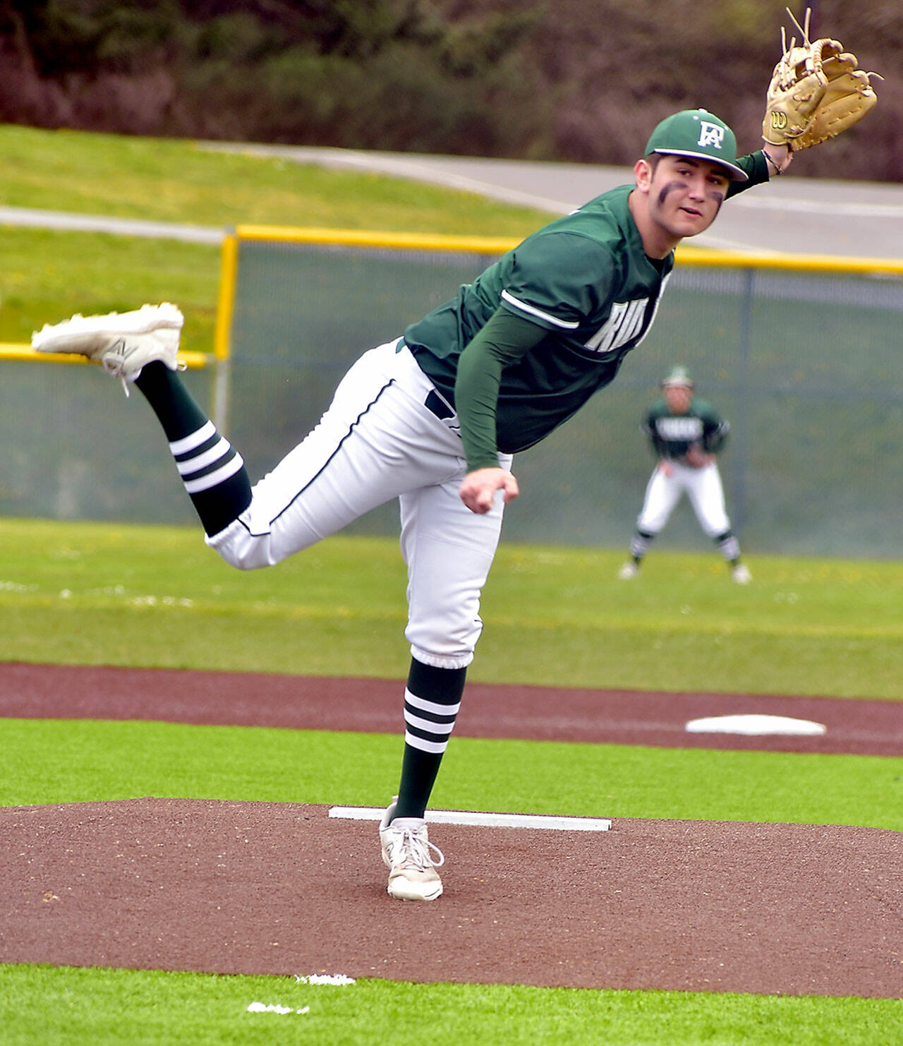 KEITH THORPE/PENINSULA DAILY NEWS
Port Angeles pitcher Colton Romero throws in the first inning against Klahowya on Friday at Volunteer Field.