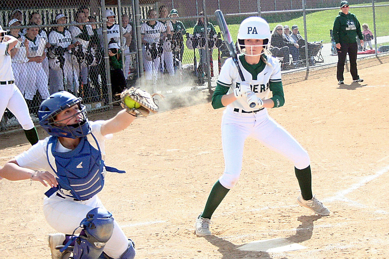 Port Angeles' Natalie Robinson takes a pitch high and outside for a ball as North Kitsap catcher Kendall Becker collects the ball. Robinson had two hits, scoring one run and driving in another. She also was part of a double-play in the seventh inning that killed a Vikings' rally. (Pierre LaBossiere/Peninsula Daily News)