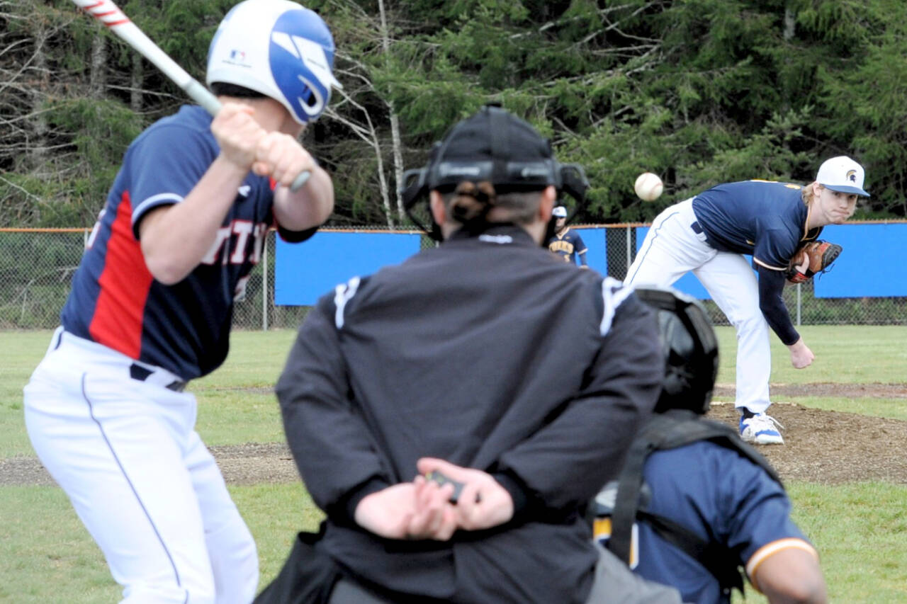 Forks' Gunner Rogers pitches to a Pe Ell/Willapa Valley batter in the first game of a doubleheader Tuesday at Fred Orr Park. Rogers was the winning pitcher in a 10-6 victory. (Lonnie Archibald/for Peninsula Daily News)