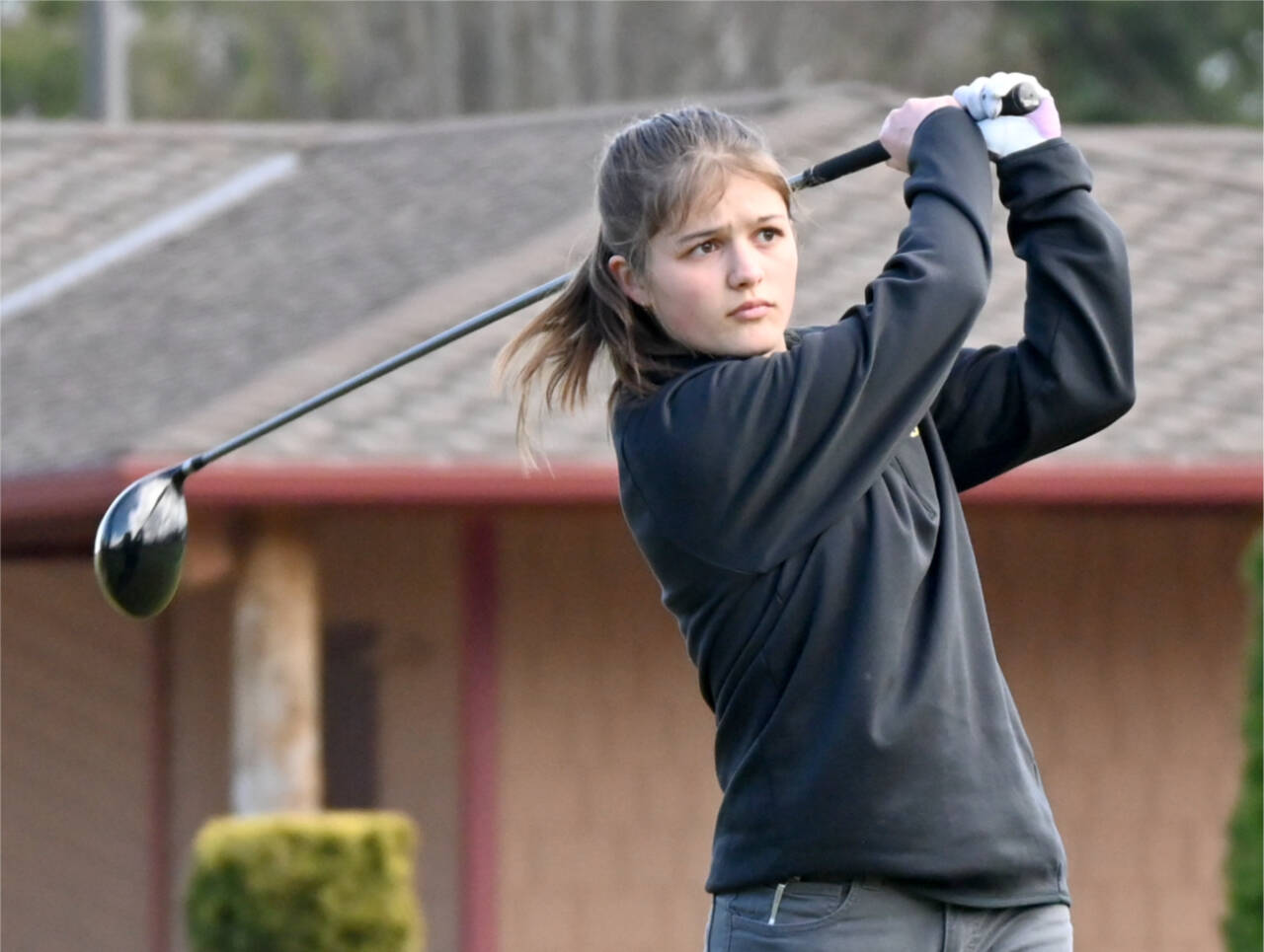 Sequim’s Raimey Brewer qualified for the 2A state girls golf tournament. Here, she is competing earlier in the season against Bainbridge. (Michael Dashiell/Olympic Peninsula News Group)