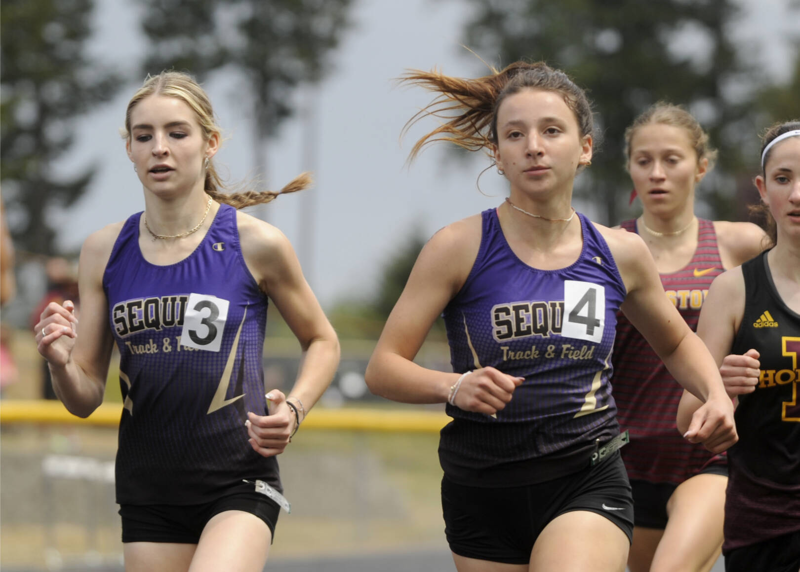 Sequim’s Dawn Hulstedt, left, and Kaitlyn Bloomenrader will run in the 800 at state at Mount Tahoma Stadium this weekend. Bloomenrader finished third and Hulstedt fourth at the district meet. (Michael Dashiell/Olympic Peninsula News Group)