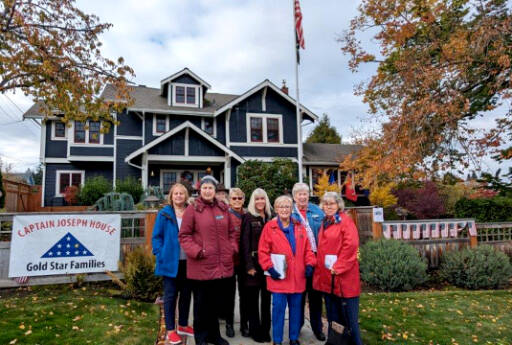 Members of the Captain Joseph House Foundation gather in October to celebrate the gifting of a Gold Star Monument marker in front of the Captain Joseph House in Port Angeles. (Courtesy photo)