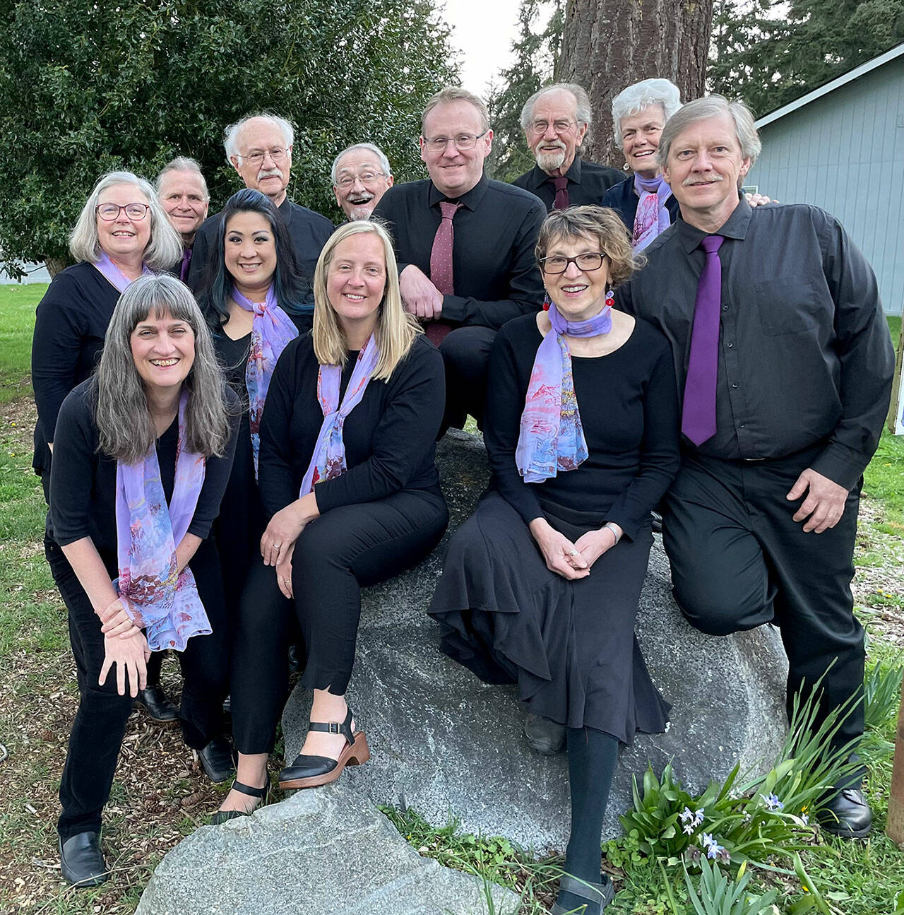 The Wild Rose Chorale embraces fun in its music. Annual concerts are Friday and Sunday. Personnel includes, from left, back row, Lynn Nowak, Rolf Vegdahl, Doug Rodgers, Al Thompson, Kris Lott, Mark Schecter, Patricia Nerison, Chuck Helman, and, from left, front row, Leslie Lewis, Cherry Chenruk-Geelan, Sarah Gustner-Hewitt and JES Schumacher. (Jo Tiffany)