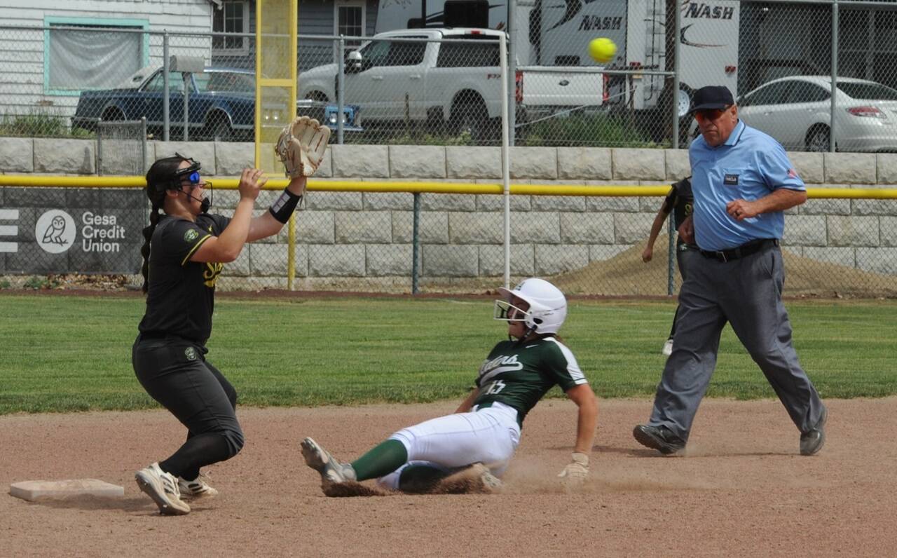 Port Angeles’ Kennedy Rognlien slides in to base against Shadle Park on Friday. The Riders beat Shadle Park 10-9, then went on to beat Lynden in the quarterfinals Friday in Selah. (Lonnie Archibald/for Peninsula Daily News)