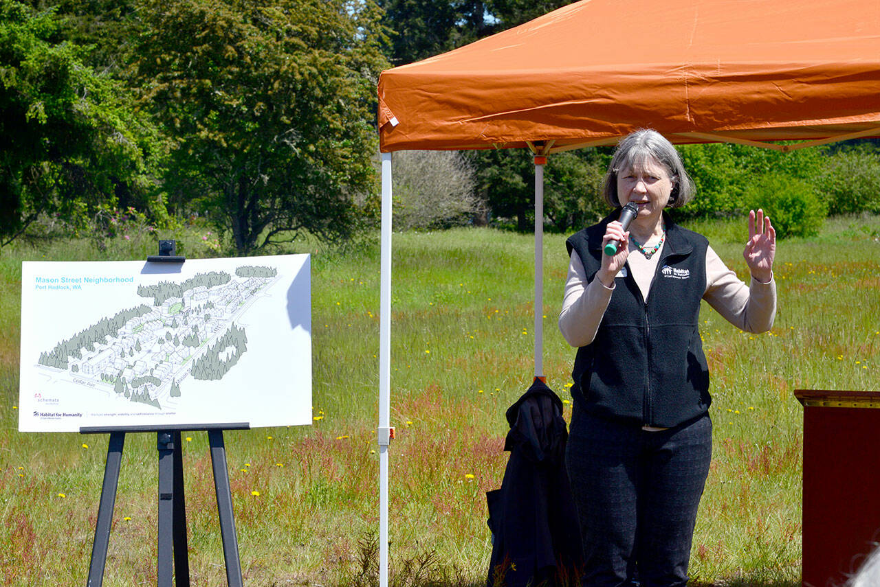 Jamie Maciejewski, the executive director of Habitat for Humanity of East Jefferson County, speaks to a crowd of more than 50 people on Thursday at the future site of Habitat’s affordable housing development in Port Hadlock. Habitat hopes to build at least 150 permanently affordable homes at the site, known as the Mason Street project. (Peter Segall/Peninsula Daily News)