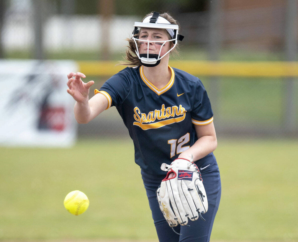 Forks’ Chloe Gaydeski delivers a pitch against Pe Ell/Willapa Valley. Gaydeski was named to the first-team all-Pacific League softball team, along with four of her teammates. (Eric Trent/The Chronicle)