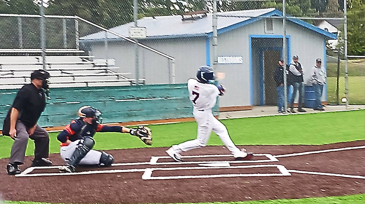 Carston Seibel (No. 7) had a hit and an RBI in the first game of a doubleheader against Whatcom Post No. 7 on Saturday at Volunteer Field. (Pierre LaBossiere/Peninsula Daily News)