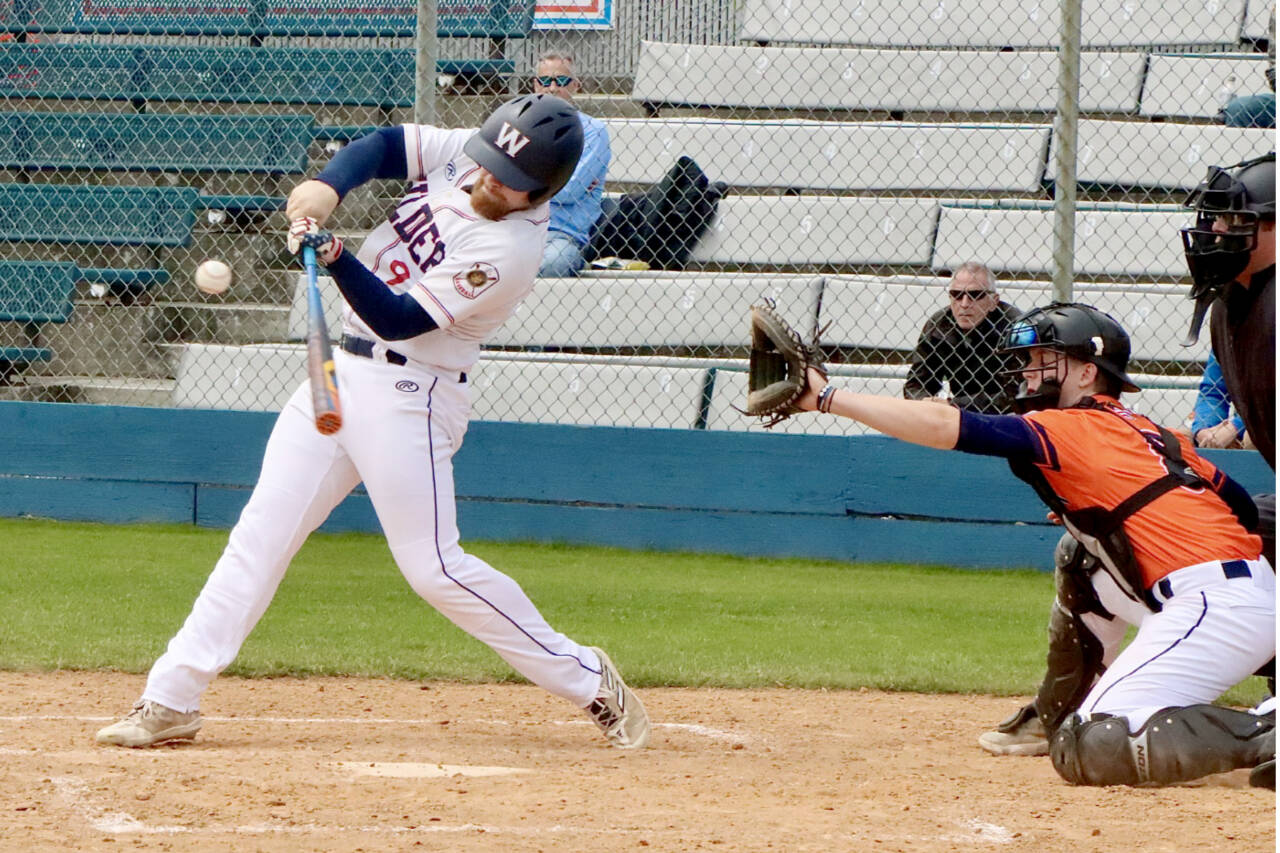 Wilder Senior’s Ezra Townsend takes a big cut at a pitch against Whatcom Post No. 7 on Sunday. (Dave Logan/for Peninsula Daily News)