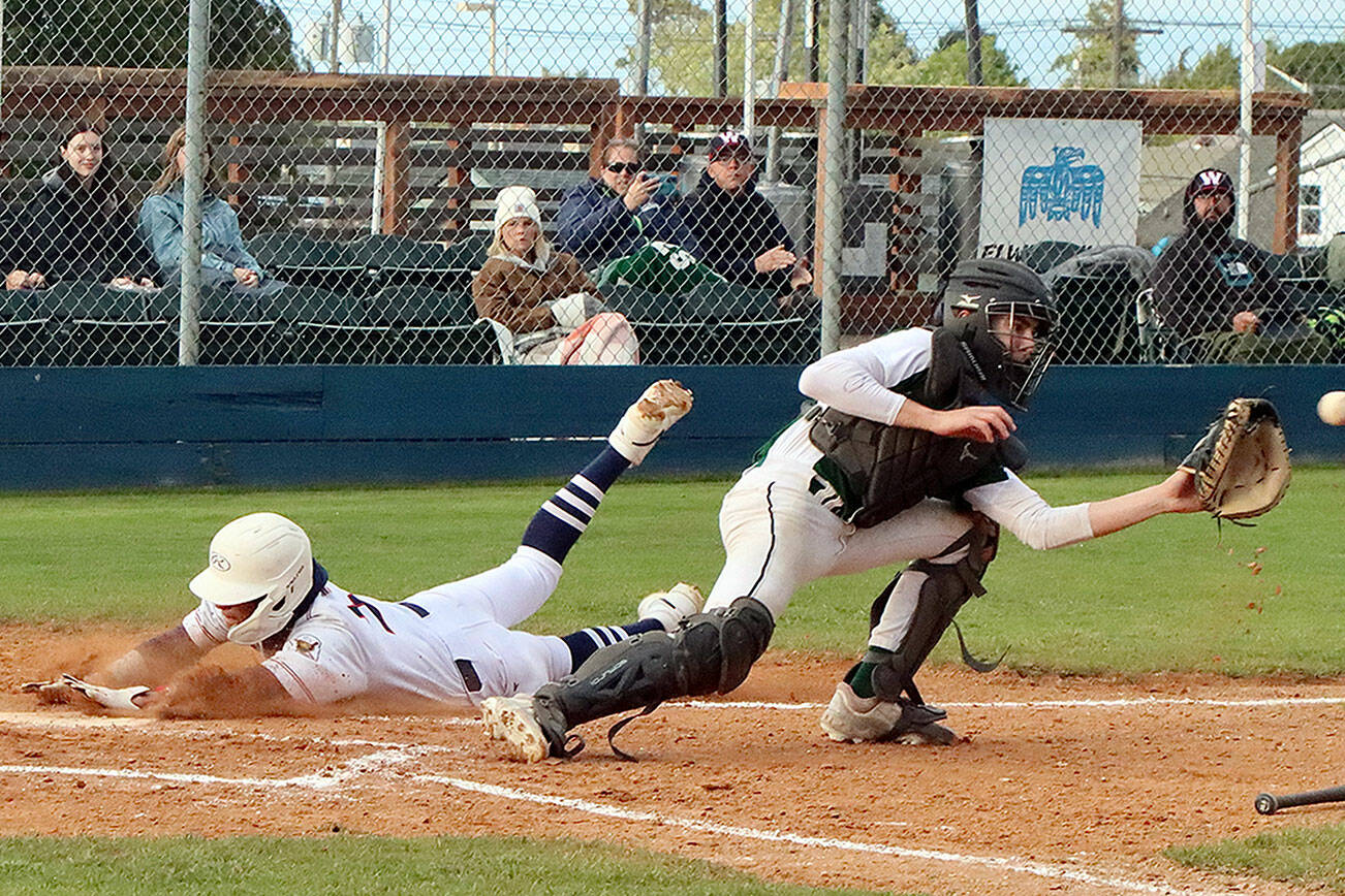 Bryant Laboy

Dave Logan/for Peninsula Daily News
Wilder Senior's Bryant Laboy slides safely home as the throw from the outfield was a bit late to the catcher during Wilder's 10-0 victory over Cascade Baseball Club Crush on Thursday at Civic Field.