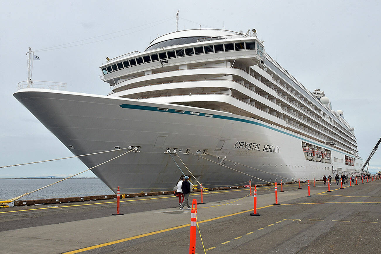 KEITH THORPE/PENINSULA DAILY NEWS
The cruise ship Crystal Serenity sits moored at Terminal 1 during a visit to Port Angeles on Saturday. Crystal Serenity is the first large cruise ship to visit Port Angeles since 2016. The 820-foot-long luxury vessel has a capacity of 740 passengers. The vessel continued to a port of call in Victoria on Sunday on its way to Vancouver, B.C.