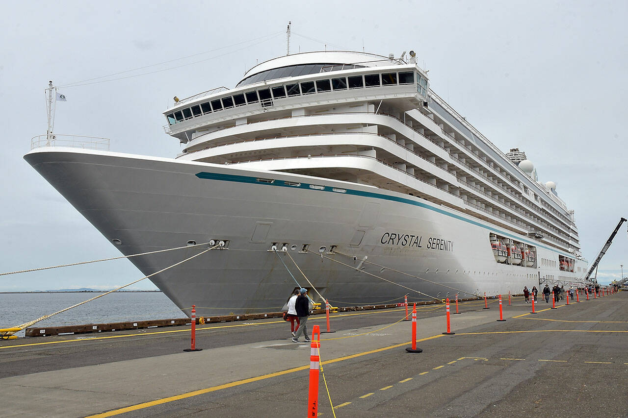 The cruise ship Crystal Serenity sits moored at Terminal 1 during a visit to Port Angeles on Saturday. Crystal Serenity is the first large cruise ship to visit Port Angeles since 2016. The 820-foot-long luxury vessel has a capacity of 740 passengers. The vessel continued to a port of call in Victoria on Sunday on its way to Vancouver, B.C. (KEITH THORPE/PENINSULA DAILY NEWS)