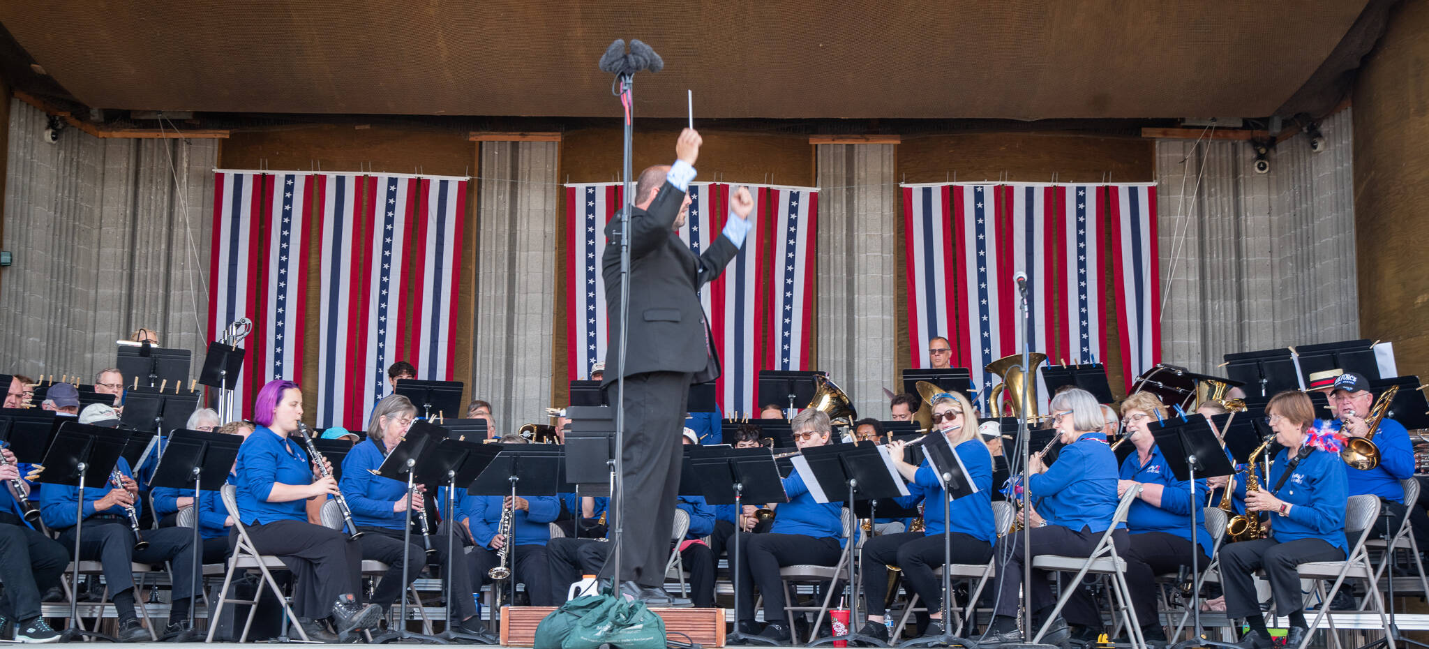 Emily Matthiessen/Olympic Peninsula News Group
Tyler Benedict leads the Sequim City Band at last year’s Independence Day celebration.