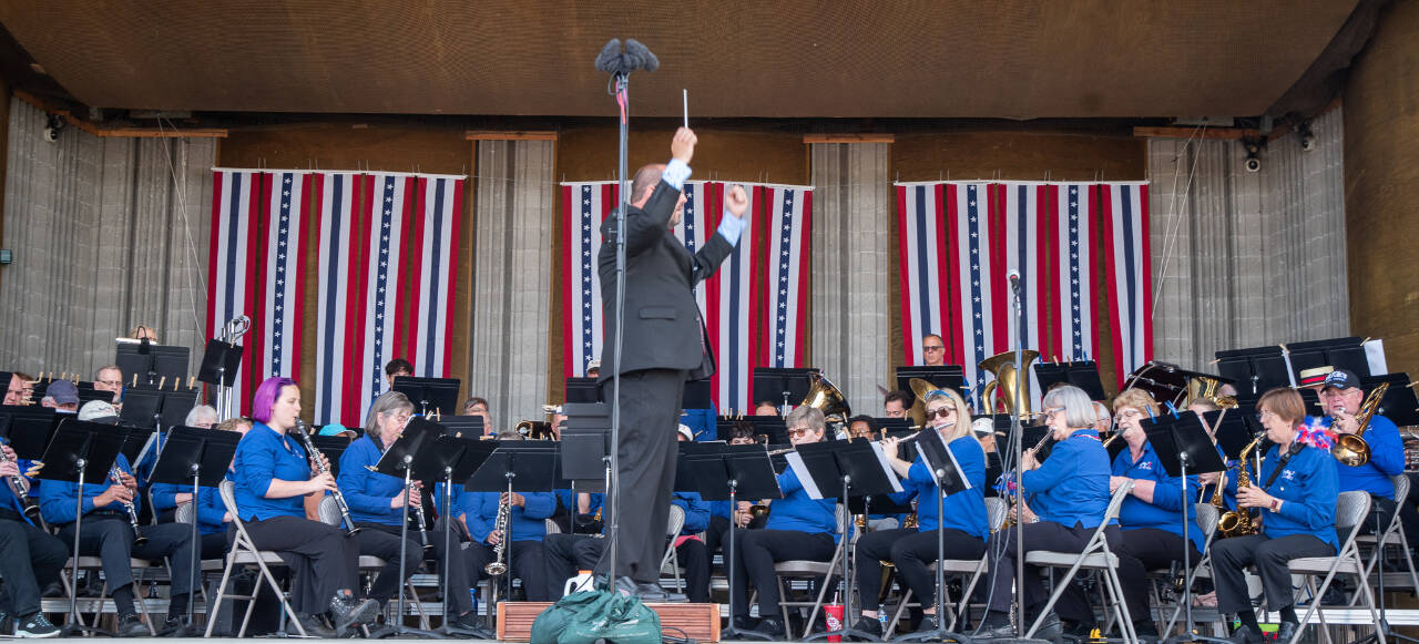Tyler Benedict leads the Sequim City Band at last year’s Independence Day celebration. (Emily Matthiessen/Olympic Peninsula News Group)