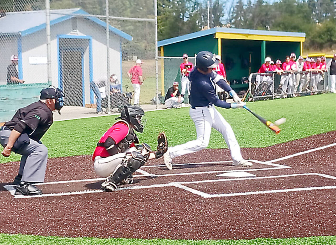 Wilder Senior's Colton Romero hits an RBI double Tuesday against WBC Colts Red. Romero came around to score on a passed ball. (Pierre LaBossiere/Peninsula Daily News)
