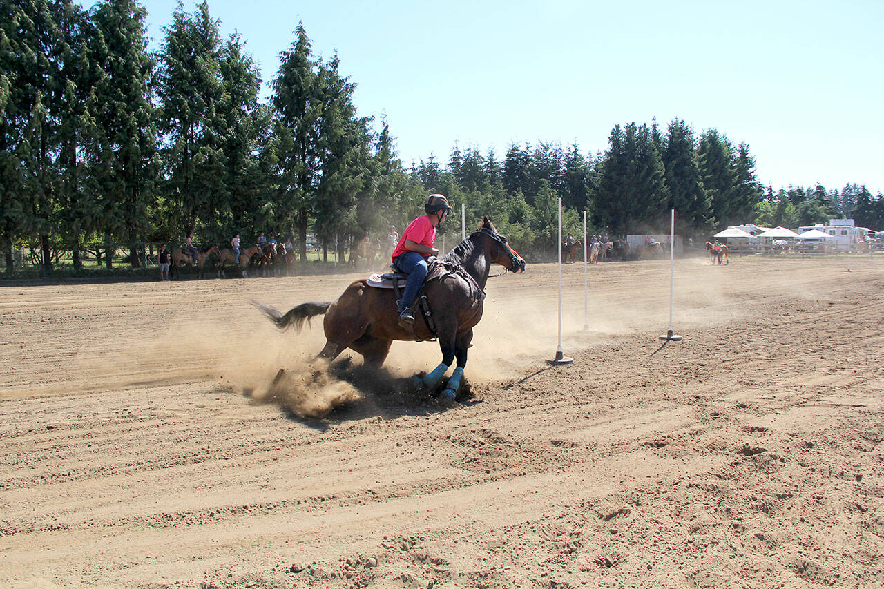 During the PSHA game show at the Crosby arena in Agnew last weekend, Duncan Parks, 18, and Ed ran a blazingly fast “A” division time of 8.45 in the Keyrace. (Karen Griffiths/for Peninsula Daily News)