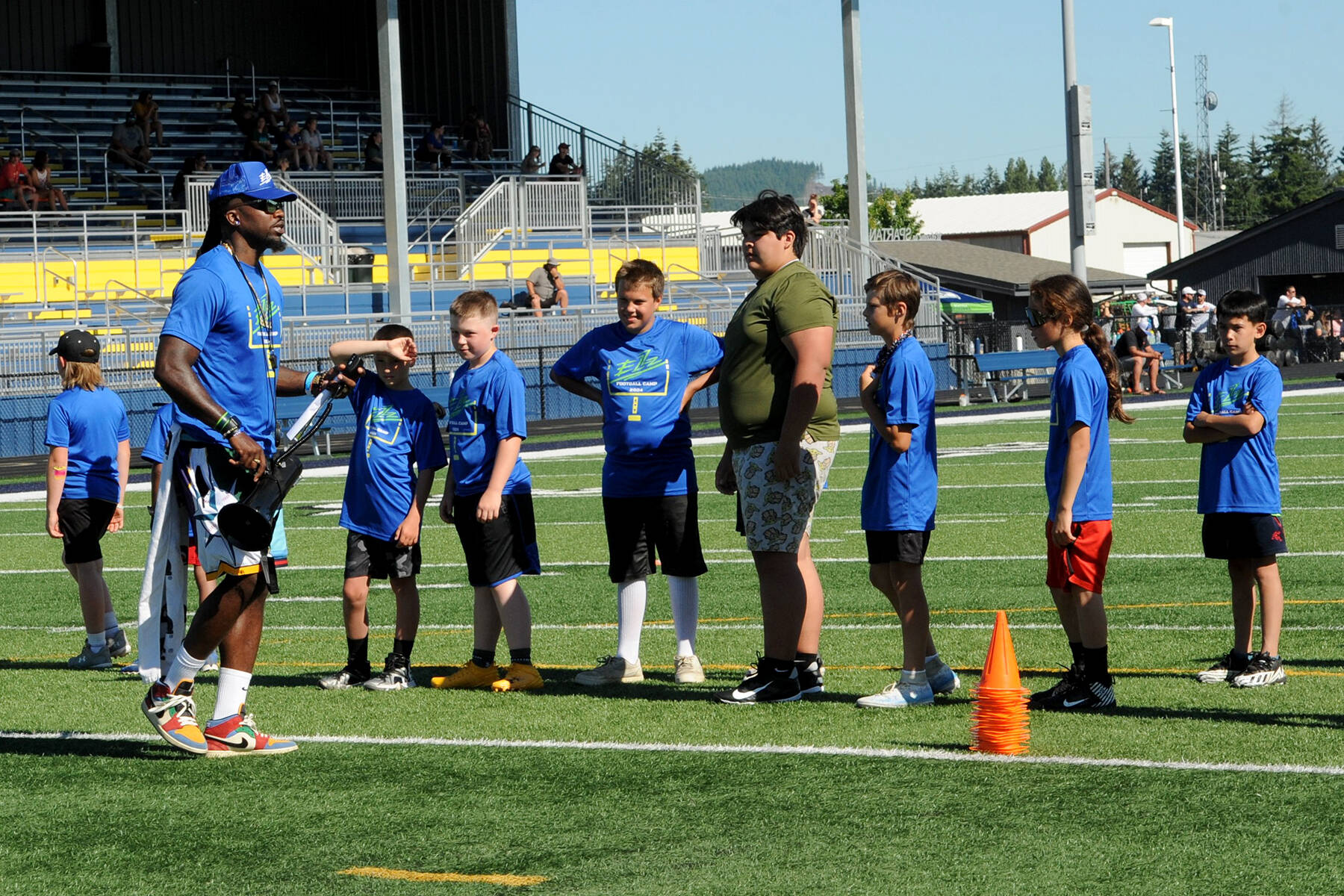 Lonnie Archibald/for Peninsula Daily News
Former Seattle Seahawks special teams captain and current coach Neiko Thorpe instructs athletes during a football camp held recently at Spartan Stadium in Forks. Some 68 participants from Forks, Neah Bay, Hoquiam and Montesano turned out for the camp. Thorpe is married to Forks native Maegan Leppell.