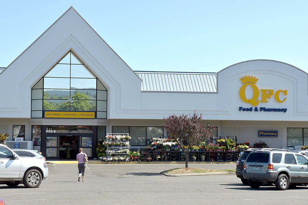 The QFC grocery store and pharmacy in Sequim is one of three North Olympic Peninsula groceries scheduled for divestment by The Kroger Co. under terms of a merger between Kroger and Albertsons Companies, Inc. (Keith Thorpe/Peninsula Daily News)
