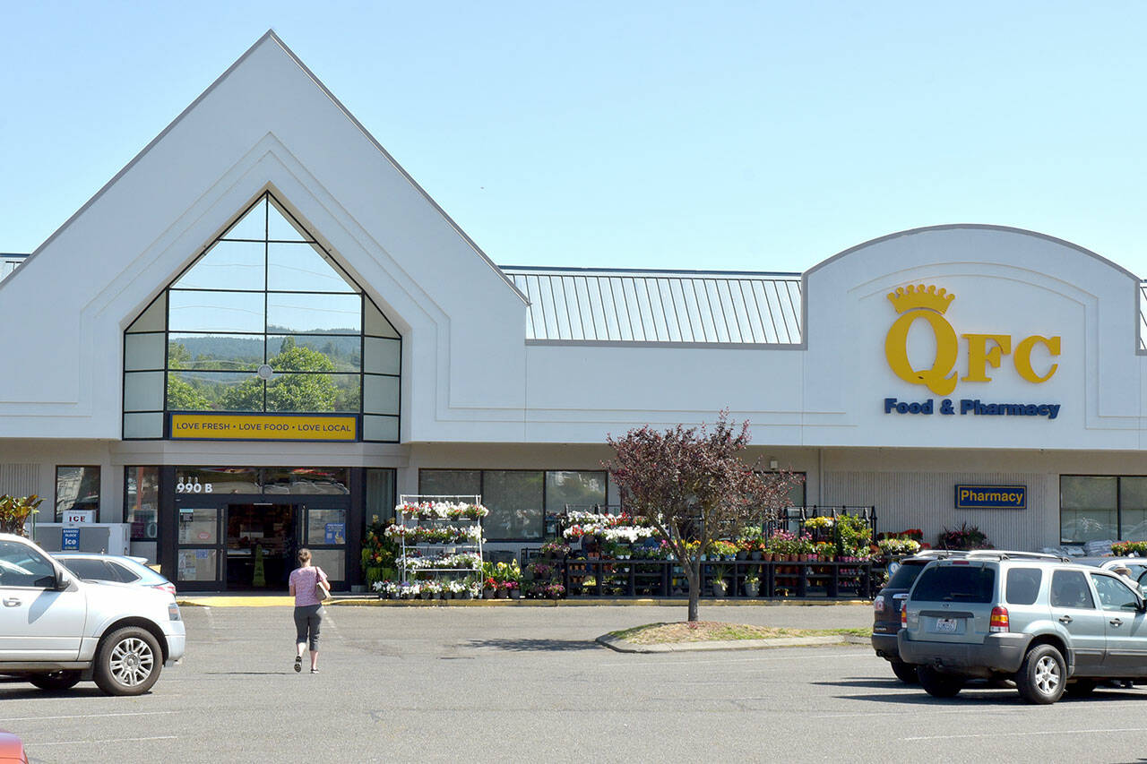 The QFC grocery store and pharmacy in Sequim is one of three North Olympic Peninsula groceries scheduled for divestment by The Kroger Co. under terms of a merger between Kroger and Albertsons Companies, Inc. (Keith Thorpe/Peninsula Daily News)