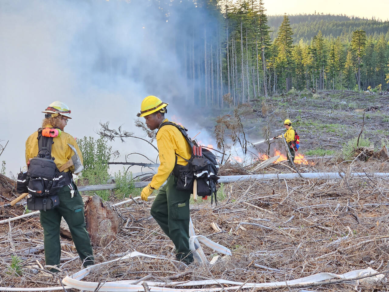 Firefighters respond to a fire near the ridge south of Port Angeles in the area known as the “Six Pack.” (Clallam 2 Fire-Rescue)