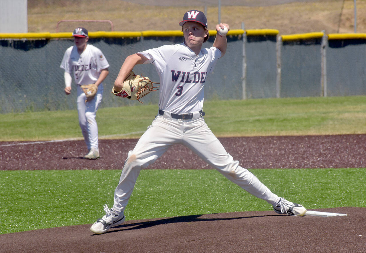 KEITH THORPE/PENINSULA DAILY NEWS Wilder Junior pitcher Hunter Stratford hurls on Saturday against the Pipeline Pirates AAA as third baseman Brandt Perry looks on during the first game of a Saturday doubleheader at Port Angeles Volunteer Field.