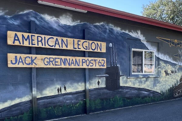 “Remember Me,” the large-scale mural on the American Legion-Jack Grennan Post 62 hall, was unveiled at a public event on Saturday. (Melissa Klein)