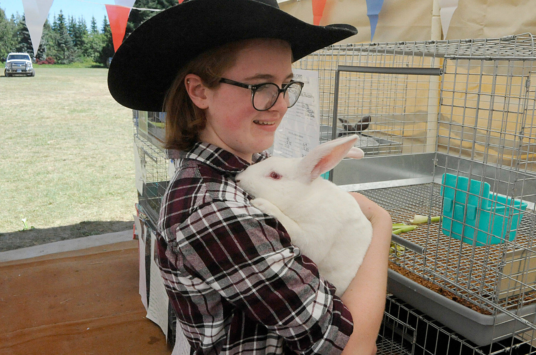 Haley Petty, 17, of Agnew earned reserve market champion with Roast the rabbit at the Clallam County Junior Livestock Auction at the Sequim Prairie Grange in 2022. This year’s auction is set for Aug. 3. (Matthew Nash/Olympic Peninsula News Group)