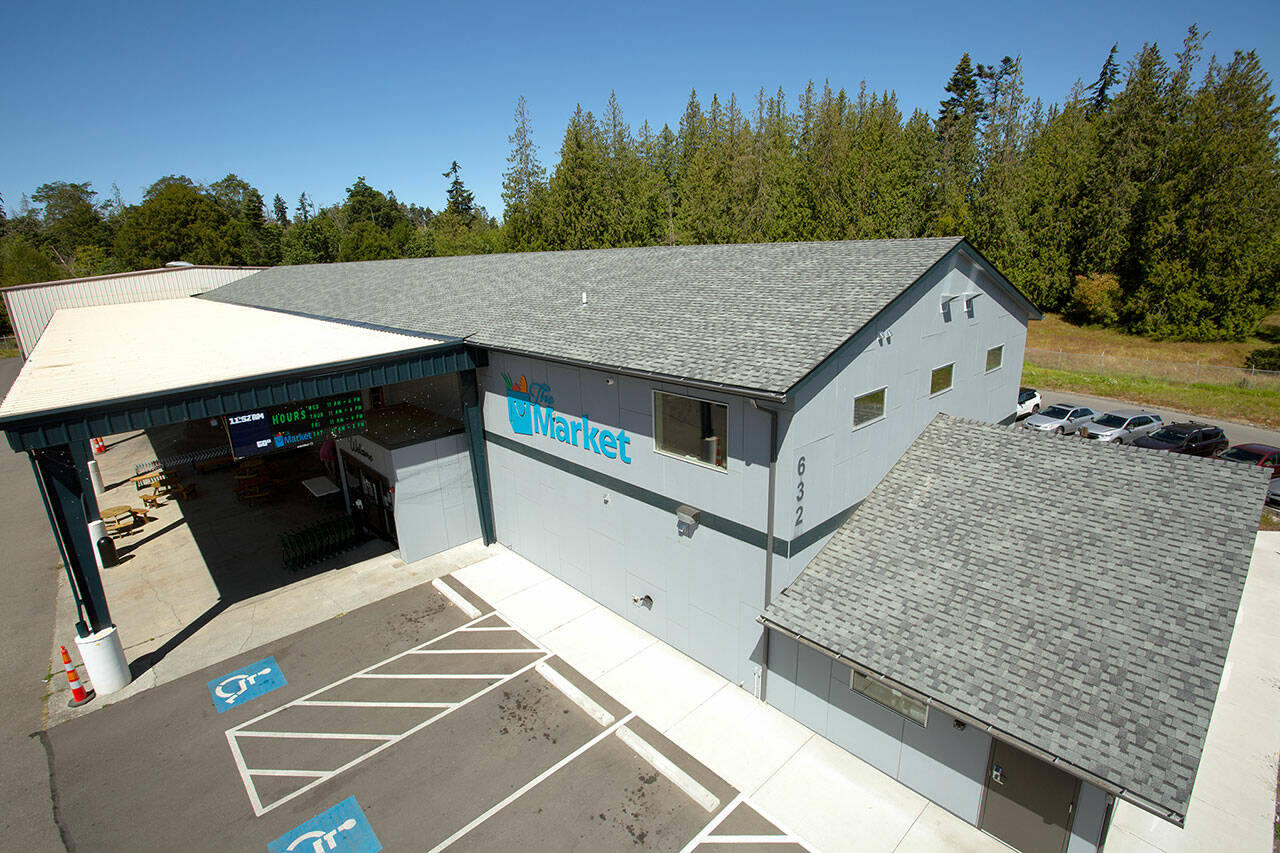 Power from above: 229 solar panels are to be mounted to the rooftop, paving the way for energy efficient operations at Port Angeles Food Bank (Christopher Urquia/Peninsula Daily News)