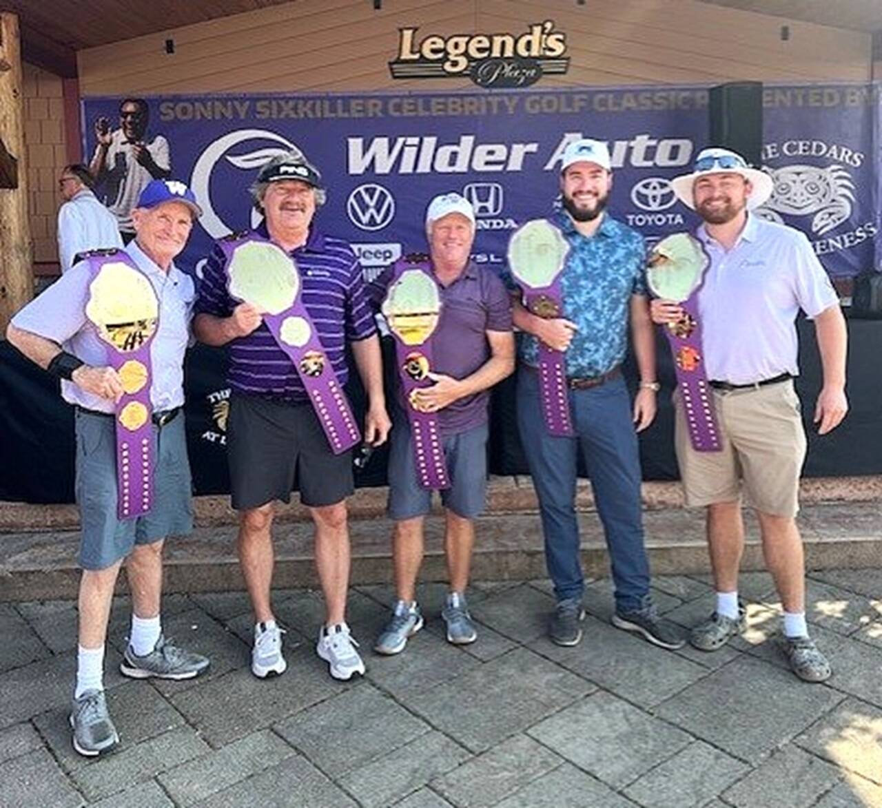 The winners of the 13th annual Sonny Sixkiller Huskies Celebrity Classic at Cedars at Dungeness. From left, Ed Cribby, Mark Mitrovich, Bob Mathews, Hunter Larson and Nick Larson played on the D.A. Davidson team. (Courtesy photo)