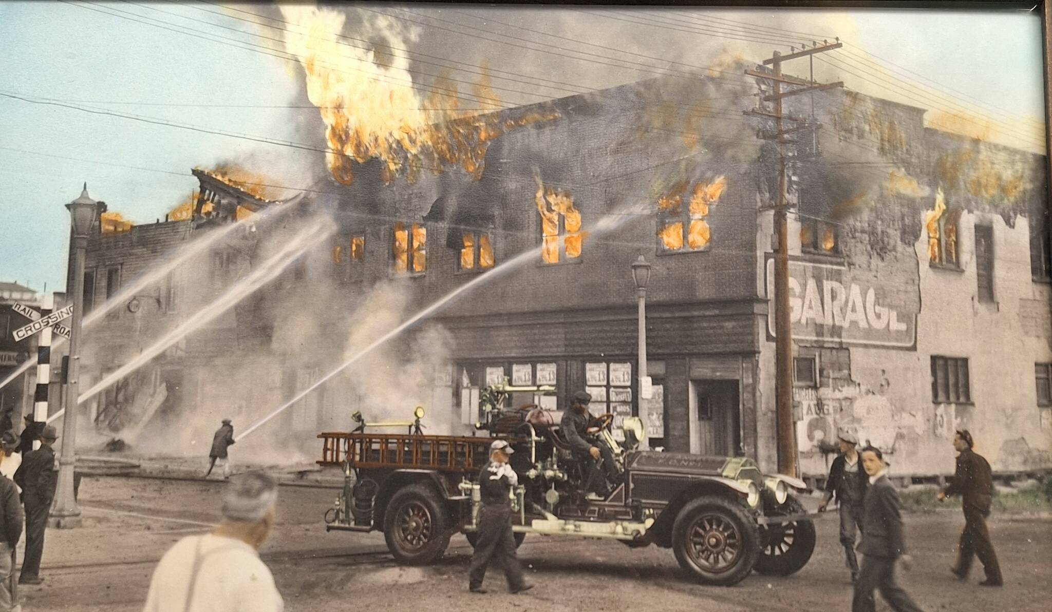 In Action circa 1930.jpg: A local fire with the fire truck in action. Courtesy of Port Angeles Fire Department.