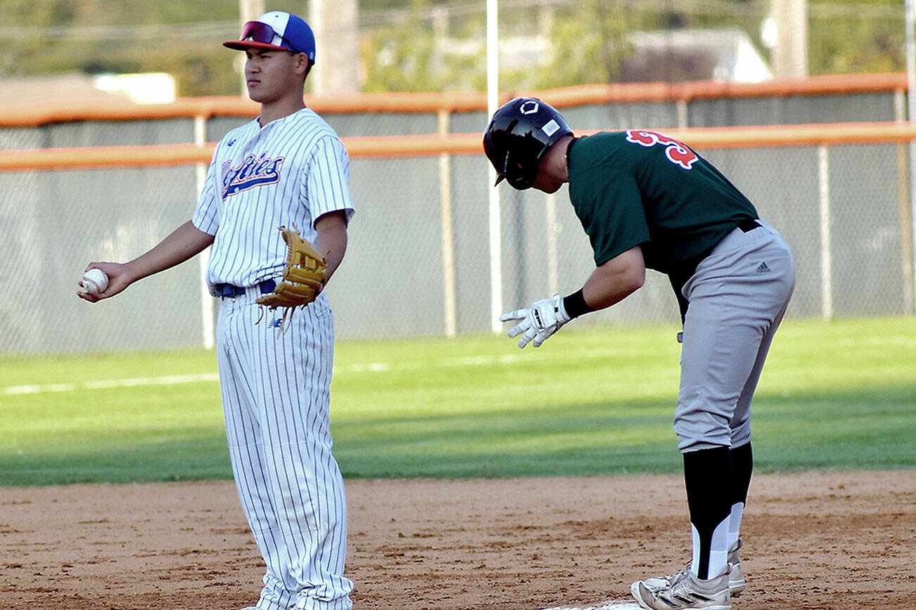 KEITH THORPE/PENINSULA DAILY NEWS
Lefties' Kosei Suzuki looks for an appeal from the umpires after Cowlitz' Shea Bowen makes a successful dash for second base during Wednesday's game at Port Angeles Civic Field.