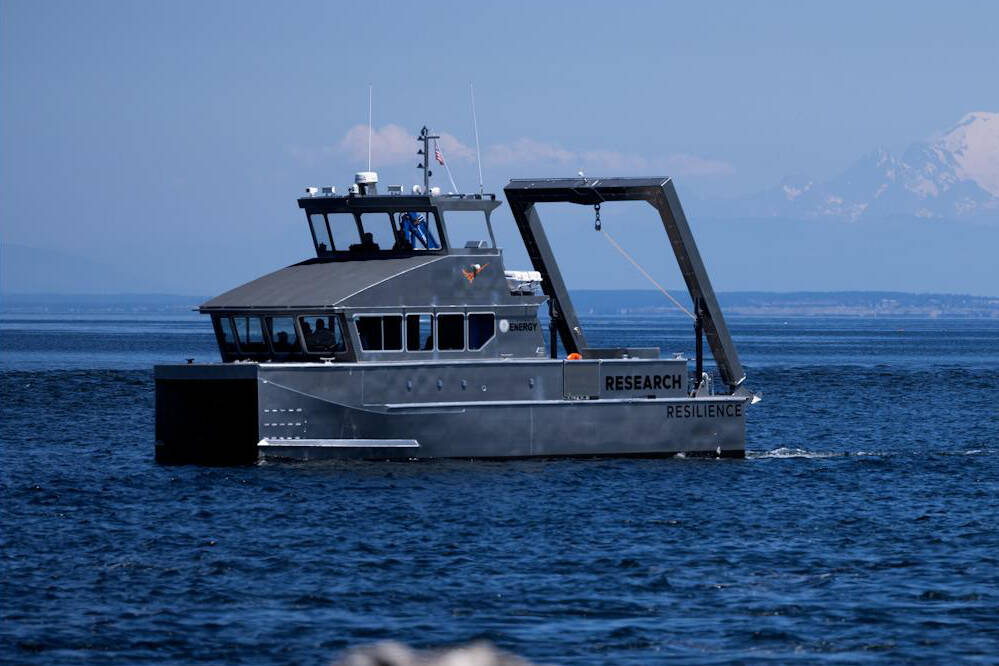 The state Department of Ecology’s first hybrid research vessel, Resilience, cruises by Sequim Bay on its way to dock at the John Wayne Marina in mid-July. The vessel will operate out of the marina for a few months while PNNL-Sequim is updating its dock. (Eric Francavilla/Pacific Northwest National Laboratory)