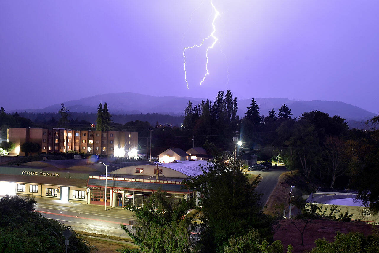 Bolts of lighting strike around the rain-obscured Klahhane Ridge area of Olympic National Park south of Port Angeles as thunderstorms work their way across the Olympic Peninsula on Saturday evening. Hundreds of strikes were recorded across the region. (Keith Thorpe/Peninsula Daily News)