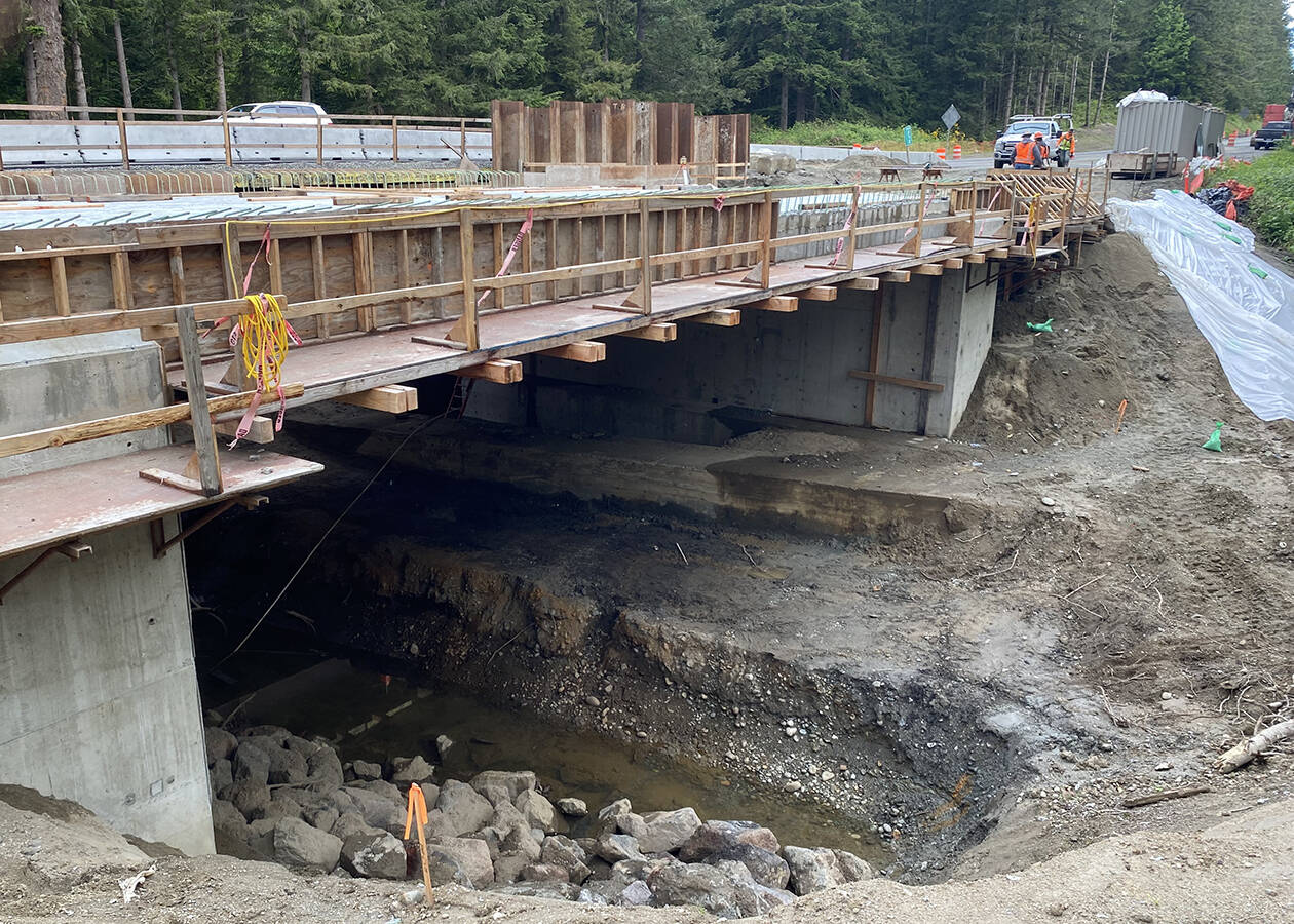 Work continues on a new bridge at Chicken Coop Creek near Blyn, with the project expected to be completed this fall. (Washington State Department of Transportation)