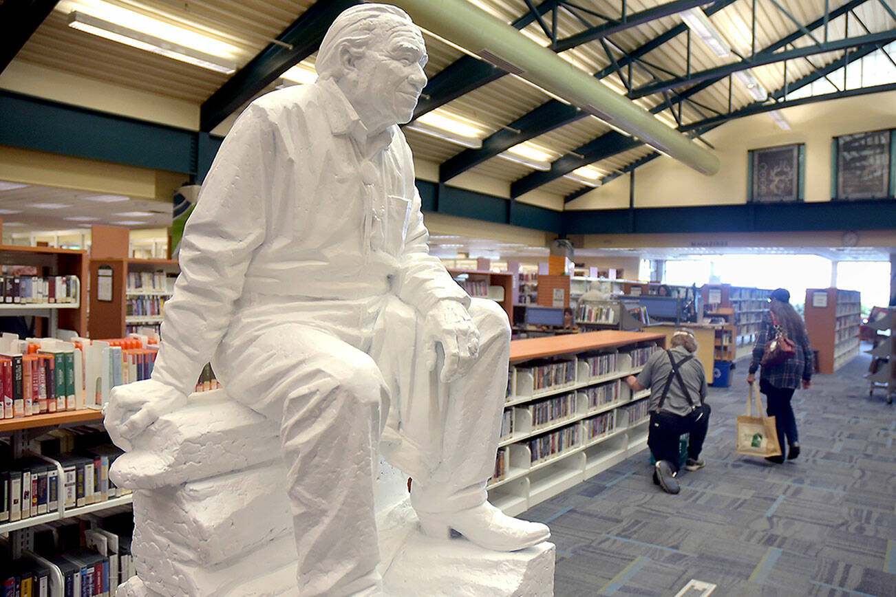 A model of a statue of Nisqually tribal activist Billy Frank Jr. by Chinese American sculptor Haiying Wu sits in the Port Angeles Public Library in conjunction with a meeting of the Northwest Indian Fisheries Commission. The model eventually will be cast in bronze and installed in the National Statuary Hall in Washington, D.C. Frank received a posthumous Presidential Medal of Freedom in 2015 for his work in fighting for tribal treaty rights and obligations. The statue will be on display at the library through Saturday. (Keith Thorpe/Peninsula Daily News)