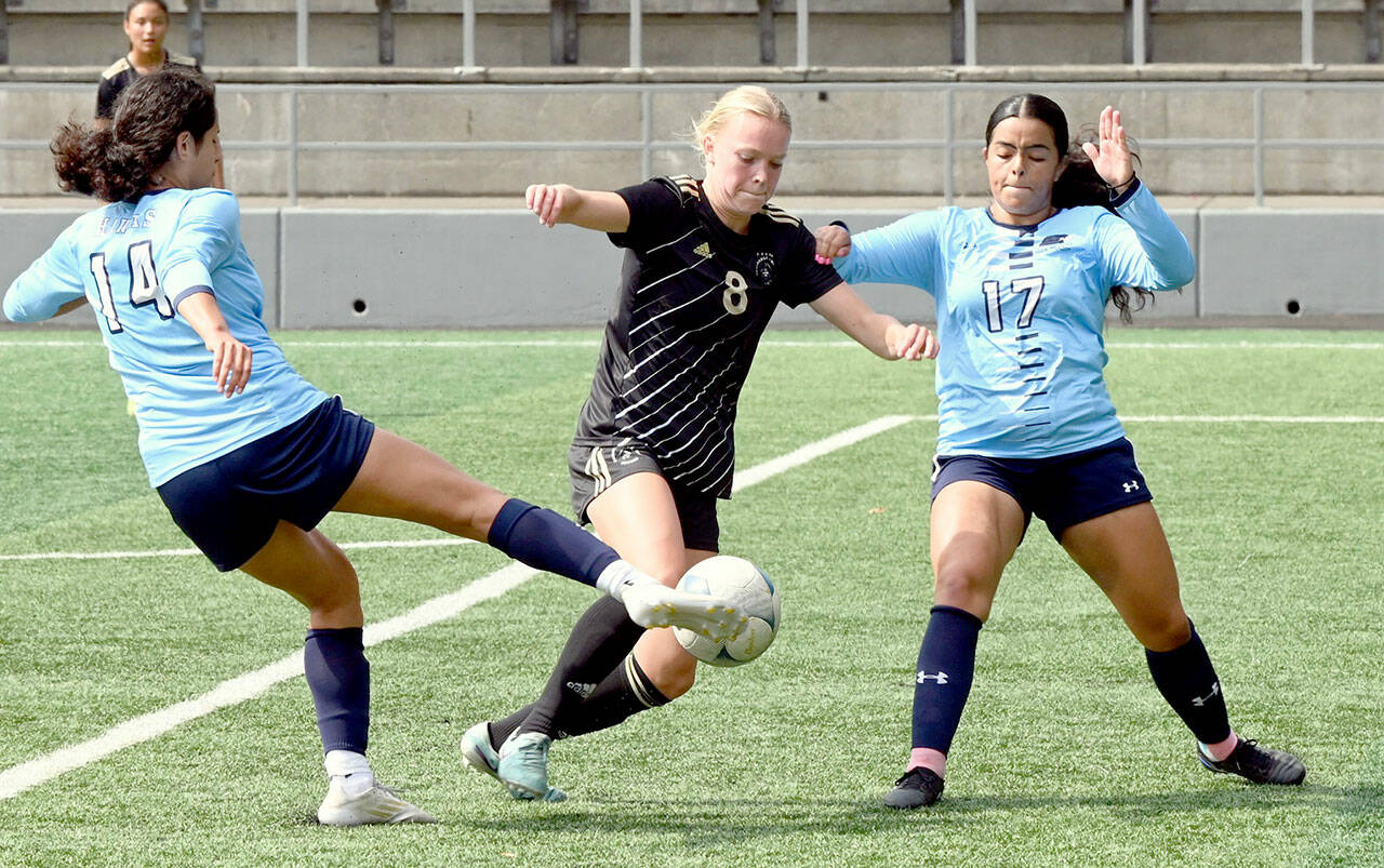 Rick Ross/Peninsula College Athletics Peninsula College’s Anna Petty, center, dribbles between Columbia Basin’s Olivia Mendoza and Julissa Caceres during the Pirates’ 3-0 win over the Hawks at the NWAC Friendlies in Tukwila.
Rick Ross/Peninsula College Athletics Peninsula College’s Anna Petty, center, dribbles between Columbia Basin’s Olivia Mendoza and Julissa Caceres during the Pirates’ 3-0 win over the Hawks at the NWAC Friendlies in Tukwila.