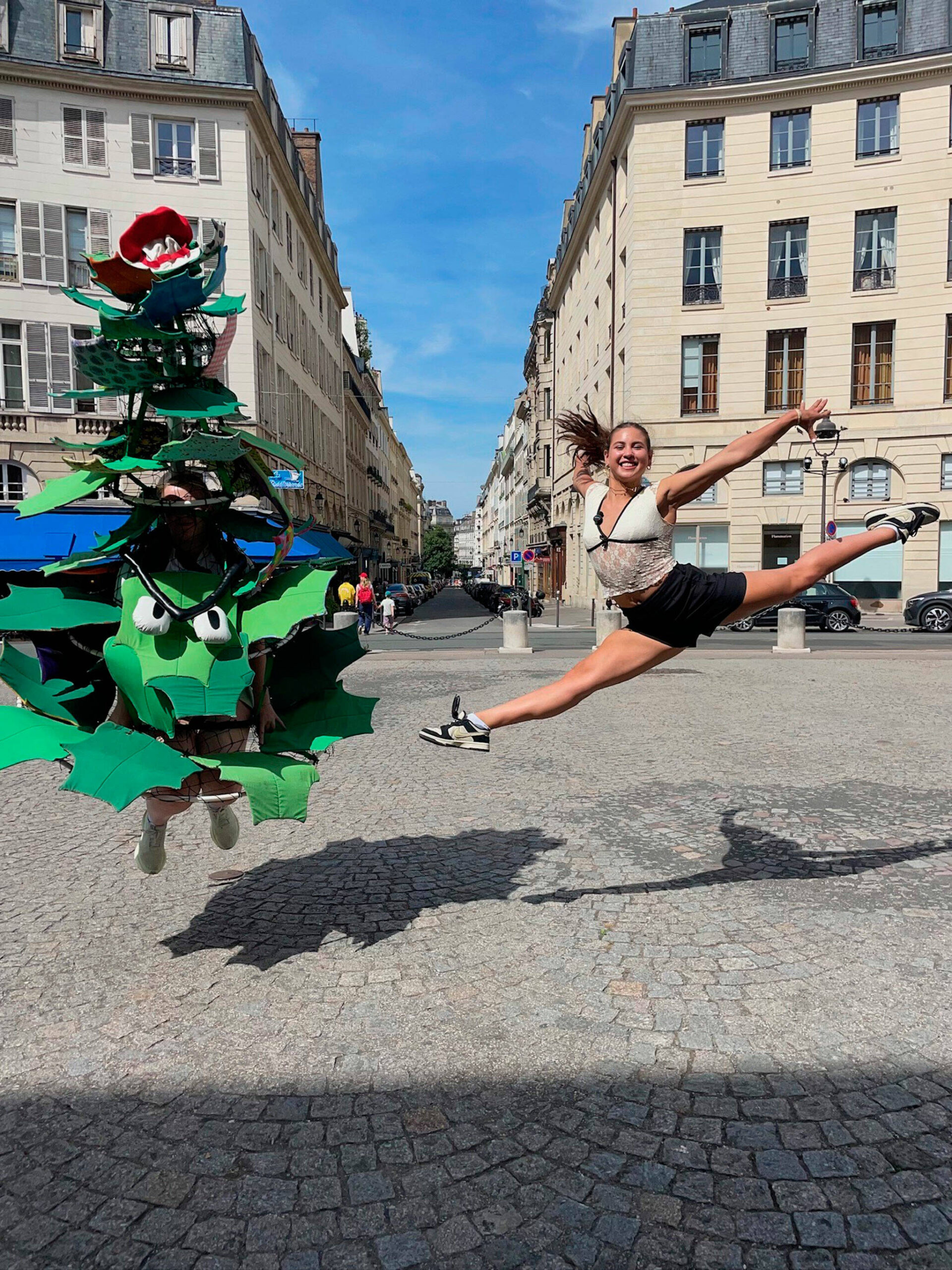 Stanford Athletics
Ruby Coulson, as the Stanford Tree, and gymnast Levi Jung-Ruivivar, who competed for the Philippines’ women’s gymnastics team and is an incoming Stanford freshman, jump together in Paris during an interview promoting the university’s many Olympians.
Ruby Coulson of Sequim, playing as the Stanford Tree, and gymnast Levi Jung-Ruivivar, who competed for the Philippines’ women’s gymnastics team and is an incoming Stanford freshman, jump together in Paris during an interview promoting the university’s many Olympians. (Stanford Athletics)