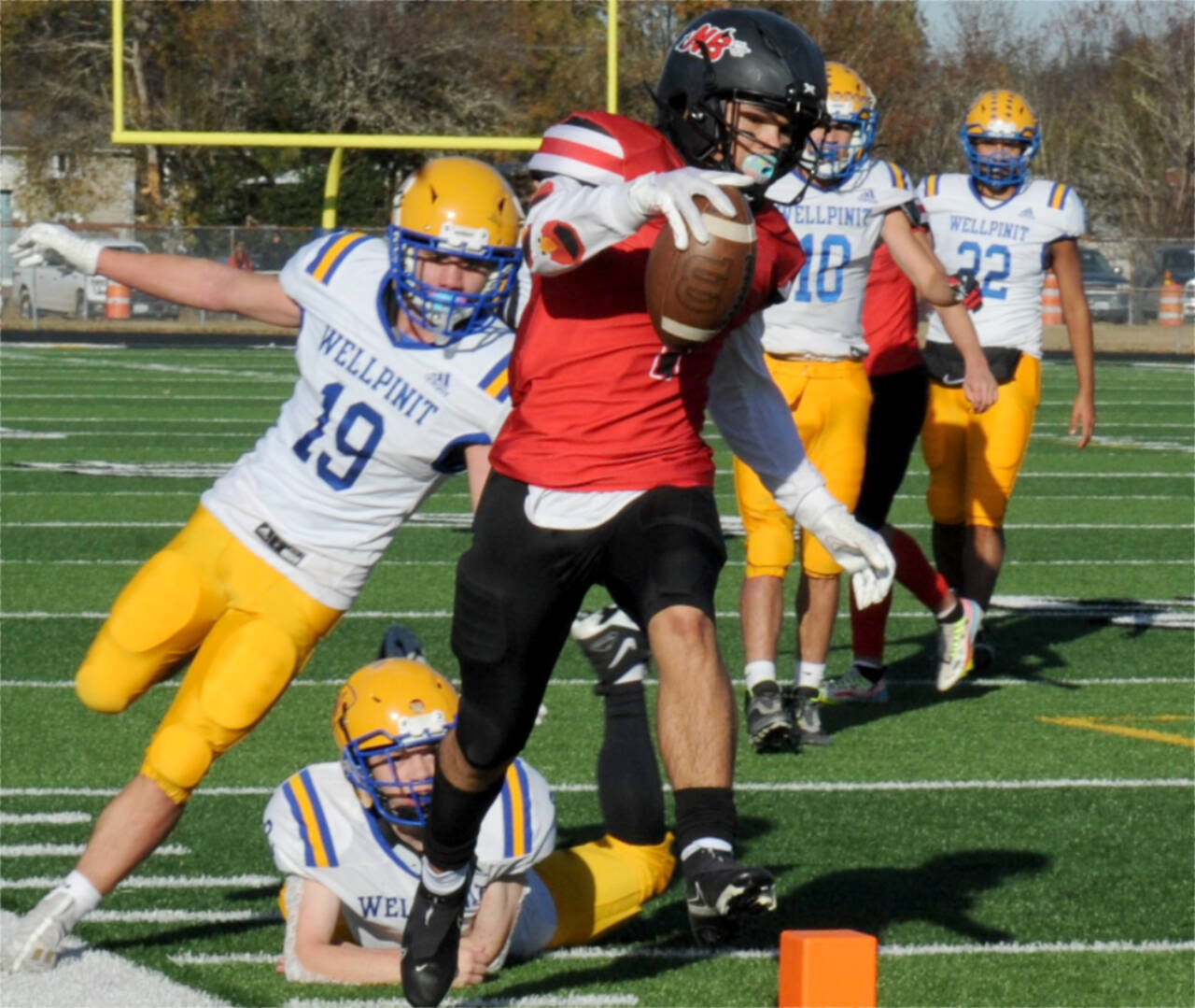 Neah Bay’s Jodell Wimberley runs for a touchdown against Wellpinit in the state playoffs in 2022 in Forks. Wimberley, who rushed for 1,839 yards last year, is back for the Red Devils. (Lonnie Archibald/for Peninsula Daily News)