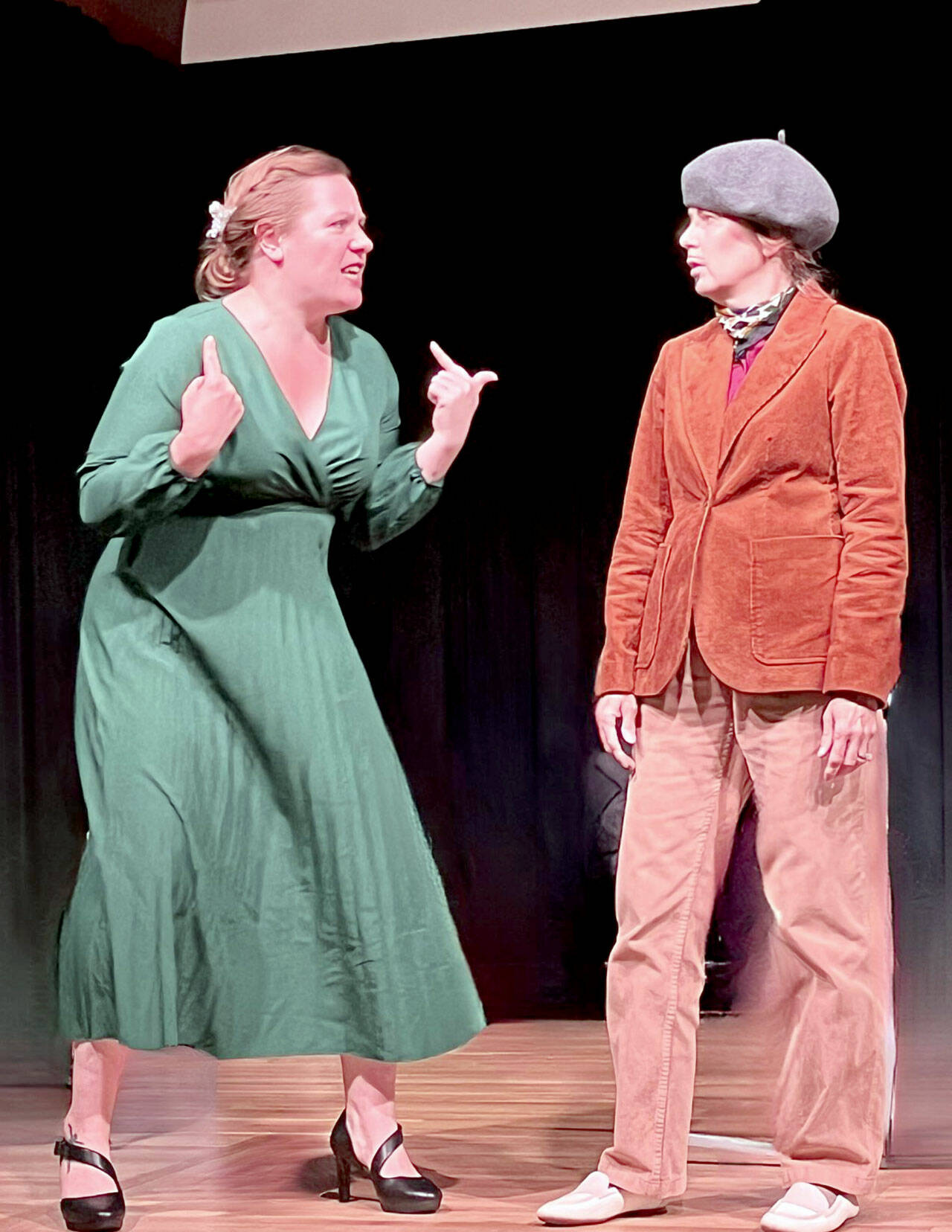 Kelly McNees as Elizabeth Hartley-Trumpington and Christie Lang as Pierre Marceau in the Ludlow Village Players’ production of “Murdered to Death.”