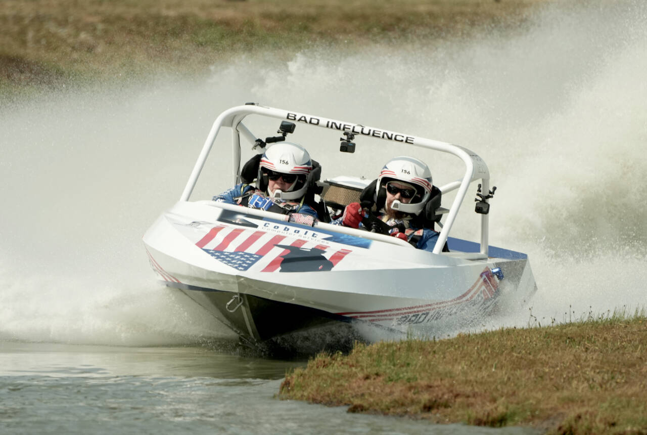 The Bad Influence 156 boat out of Oregon competes at the Extreme Sports Park on July 27. The sprint boats are returning for another weekend of racing beginning at 10 a.m. Saturday and 10 a.m. Sunday. It’s part of a very busy weekend of sports with prep football beginning Friday, the NW Cup Downhill bike races all weekend at Dry Hill and the GOAT endurance run. (Jeff Halstead/for Peninsula Daily News)