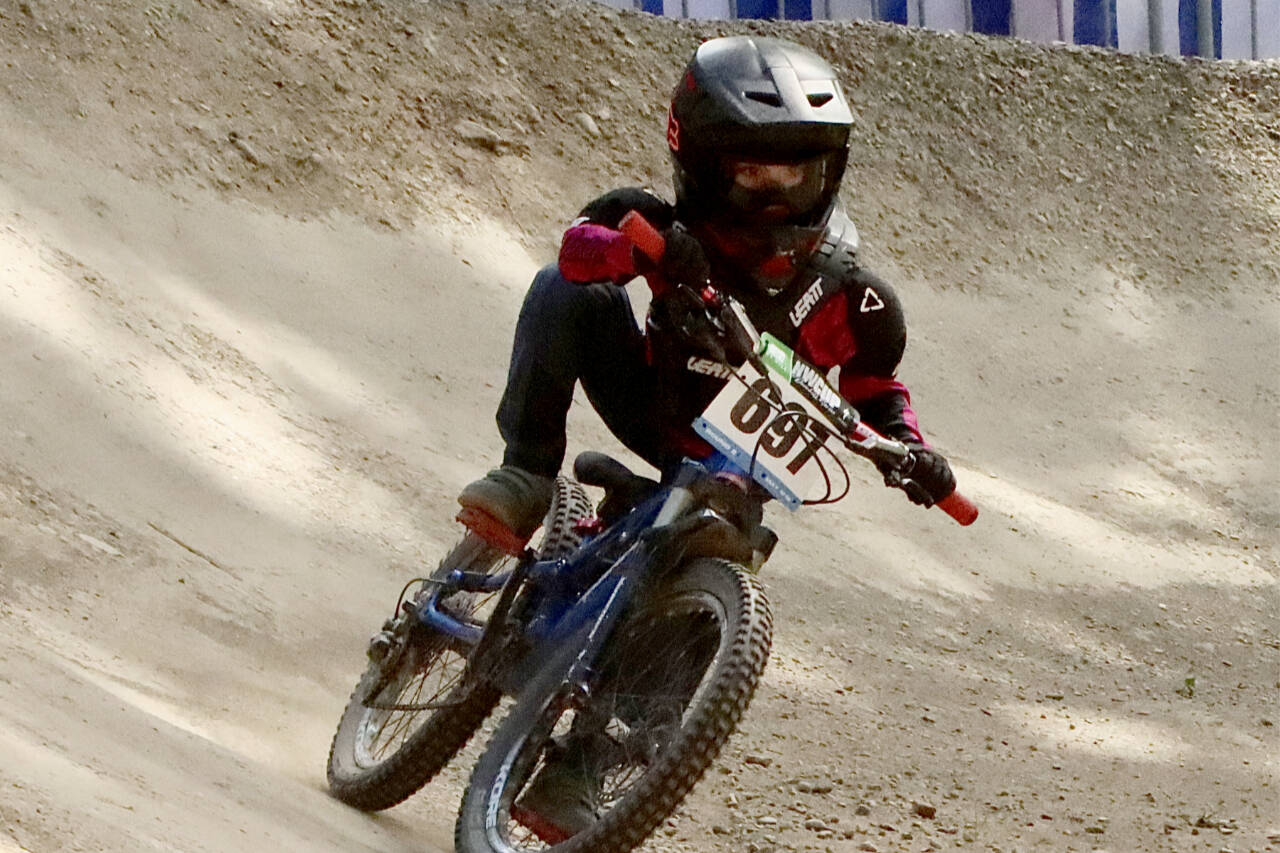 Kaiden Silva of Bellingham rides in the boys U7 category in the second running of the NW Cup at Dry Hill in May. The championship of the seven-race NW Cup series will be held Sunday at Dry Hill, one of three major sporting/outdoor events on the Peninsula this weekend. (Dave Logan/for Peninsula Daily News)