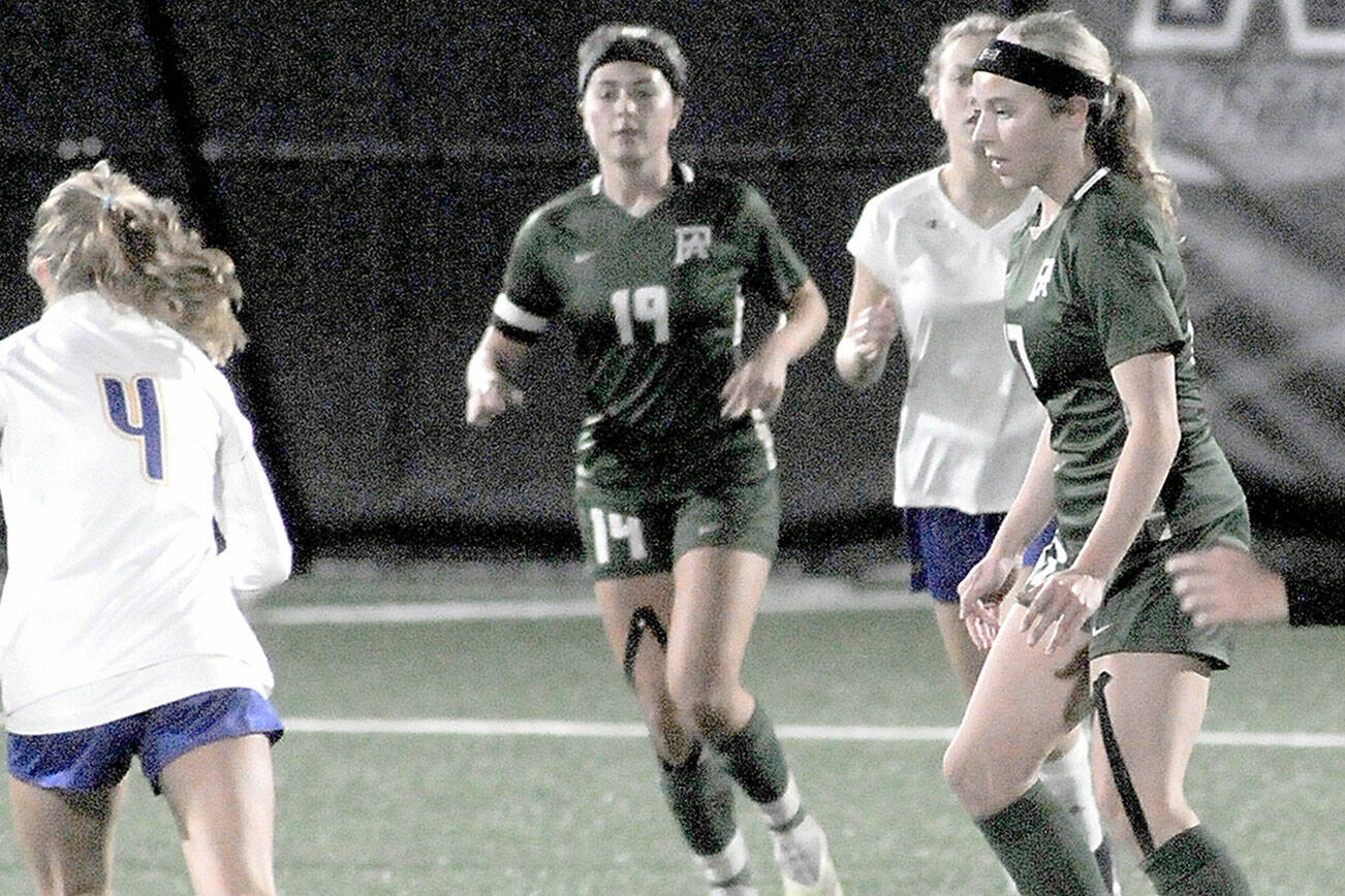 KEITH THORPE/PENINSULA DAILY NEWS
Port Angeles Ava-Anne Sheahan, right, is the Roughriders lone returning senior starter from last season's state-bound girls soccer team.