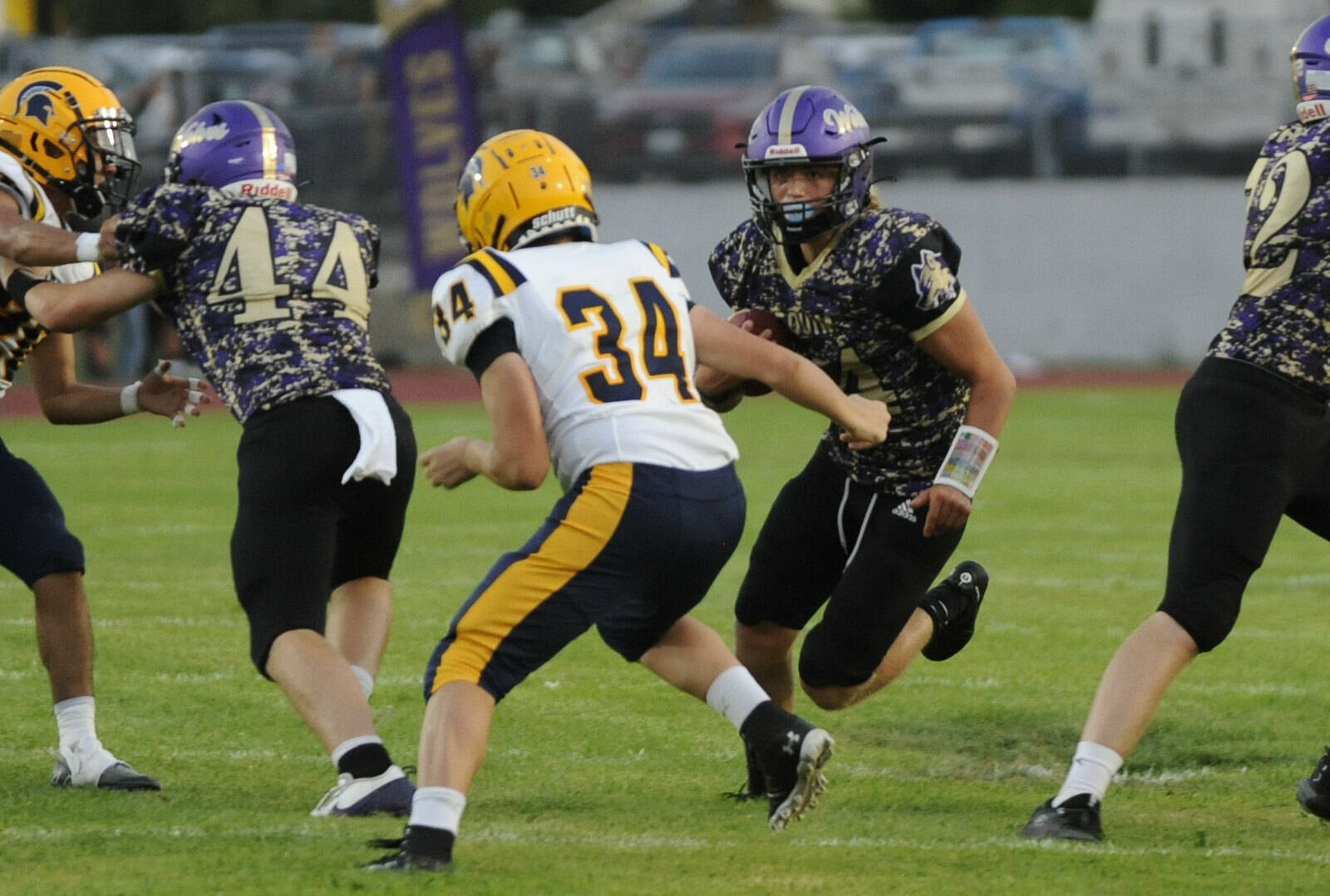 Michael Dashiell/Olympic Peninsula News Group
Sequim's quarterback Zeke Schmadeke runs with the ball against Forks.