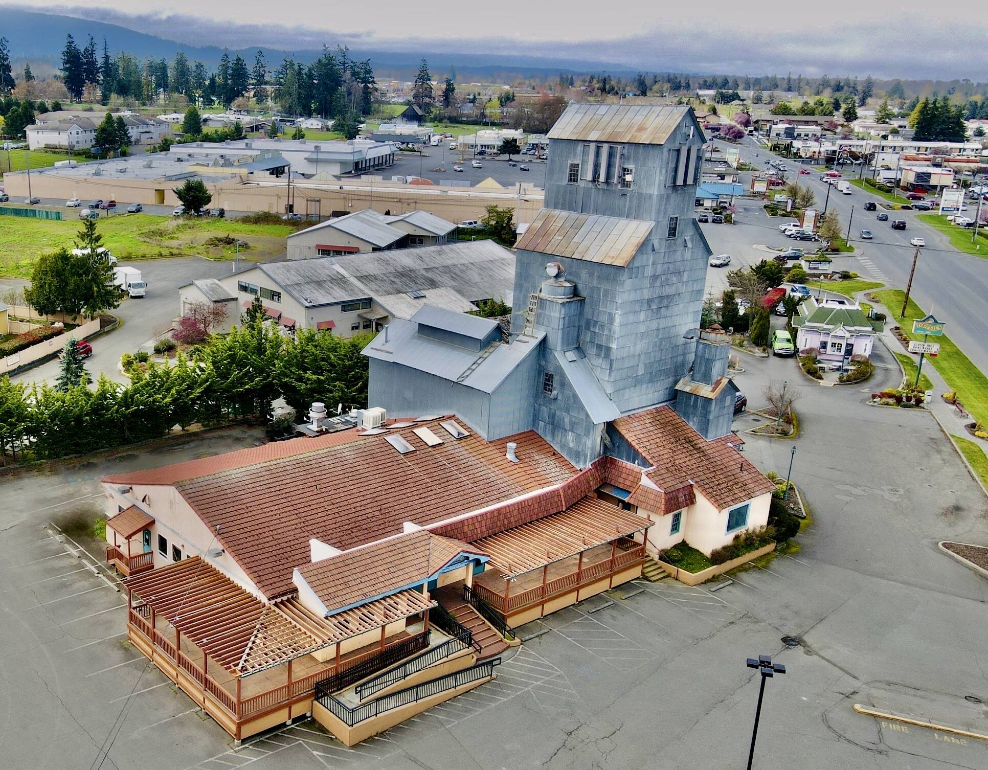 The site of a mill, granary/grain elevator, a mall, restaurants and more, Sequim’s “skyscraper” at 531 W. Washington St. is being prepped for a trio of businesses by Sequim residents Jason Hoffman and Ryan Schaafsma. (Ryan Schaafsma)