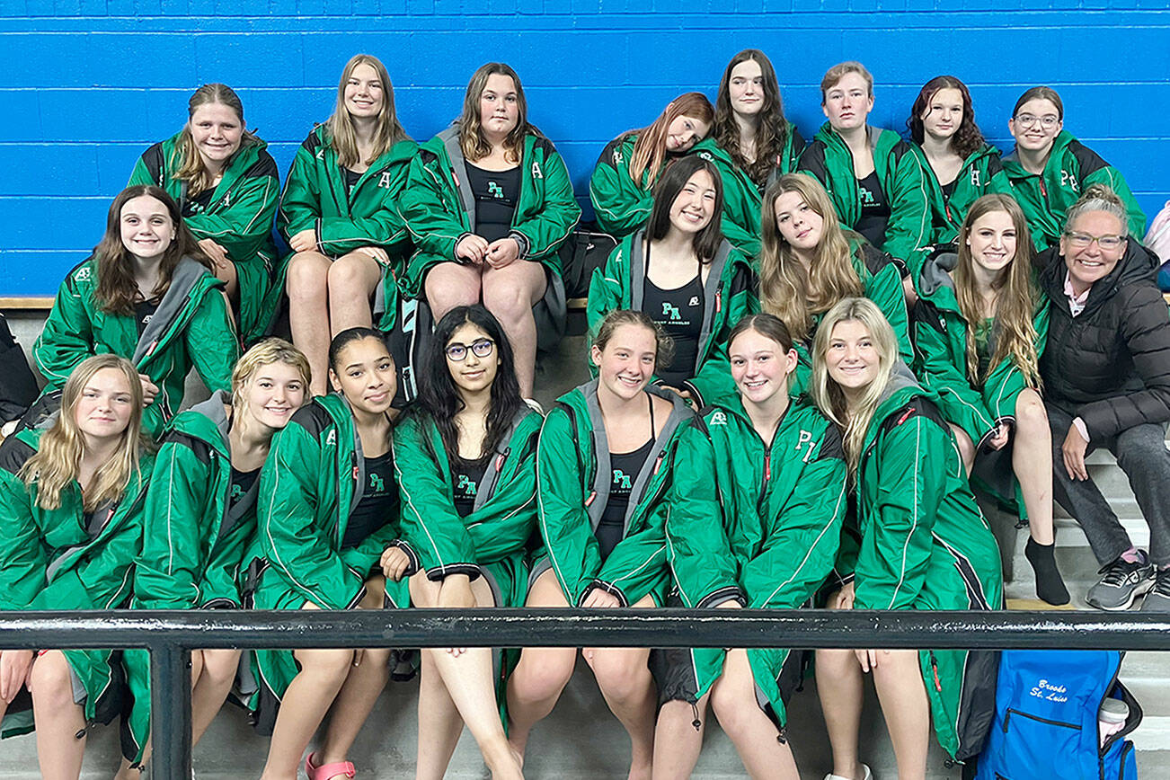 The Port Angeles girls swim and dive team competed at the Olympic League Jamboree on Wednesday. Top row from left, Lilly Mahaney, Grace Kathol, Grace Williams, Ana Kay-Sanders, Sally Kasten, Dorothy Fetterman, Charlie Logue, Mallory Hartman; middle row: Lucy Townsend, Danika Asgeirsson, Amayah Nelson, Chloe Kay-Sanders, coach Sally Cole and bottom, Mia Francis, Bella Sains, Shavari Epps, Damun Seera, Lizzy Shaw, Lynzee Reid and Brooke St. Luise.