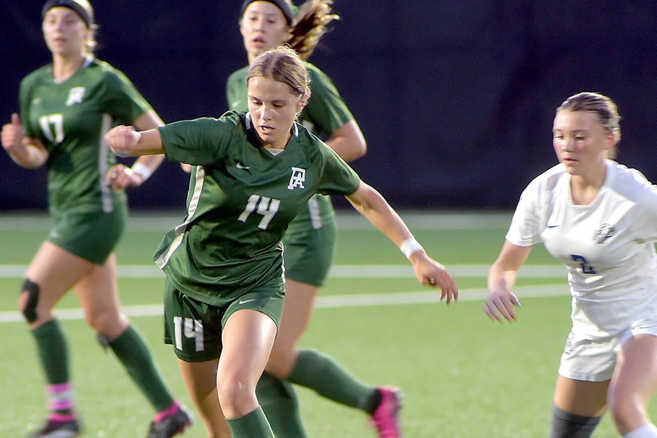 KEITH THORPE/PENINSULA DAILY NEWS
Port Angeles' Sophia Ritchie, front left, storms past North Mason's Addisen Sheridan, right, as teammates Ava-Anne Sheahan, rear left, and Cayleigh Alward keep pace on Thursday night in Port Angeles.