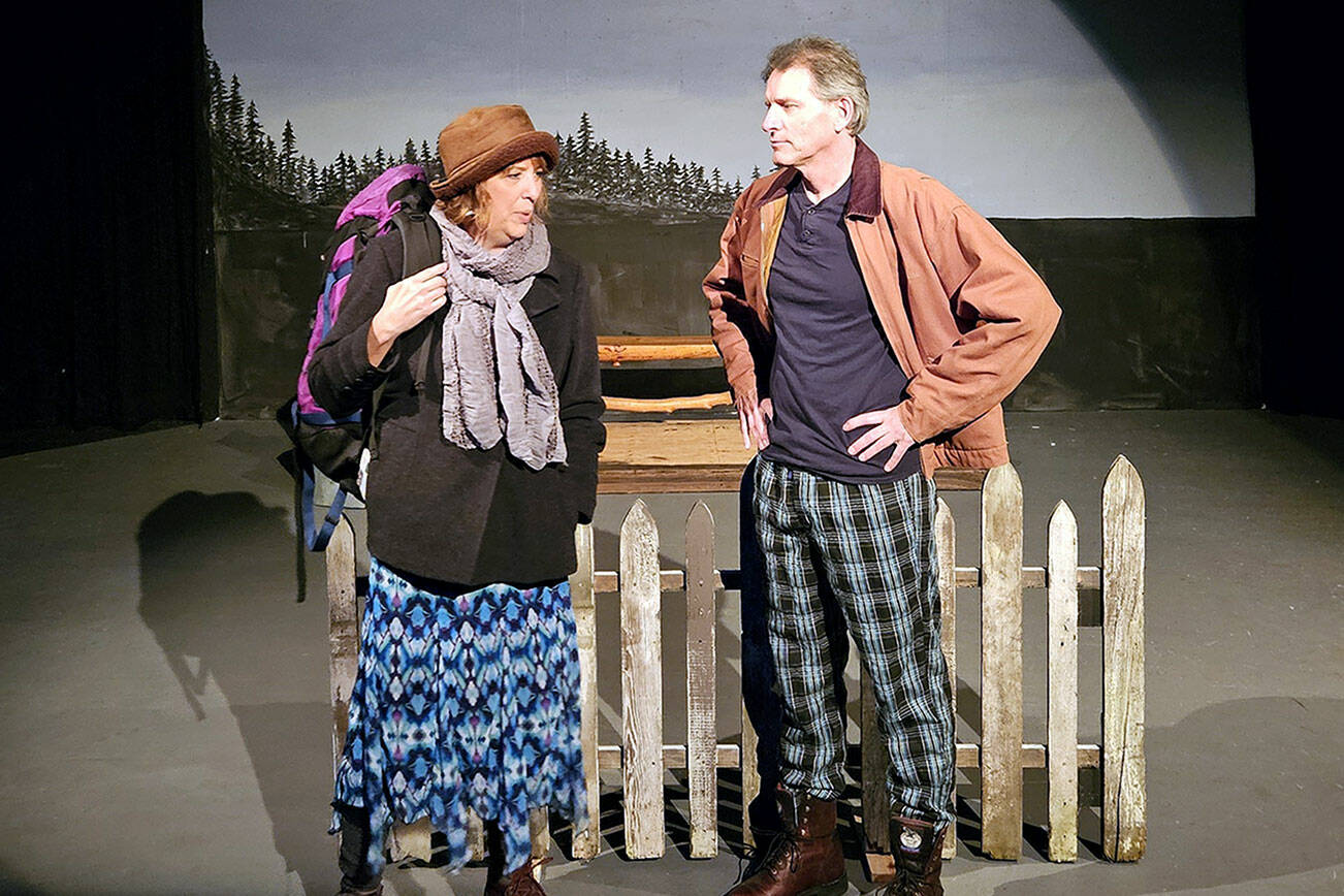 Rebecca Gilbert, left, and Rick Mischke, both of Port Angeles, at a recent rehearsal of a scene from the play “Almost, Maine.”