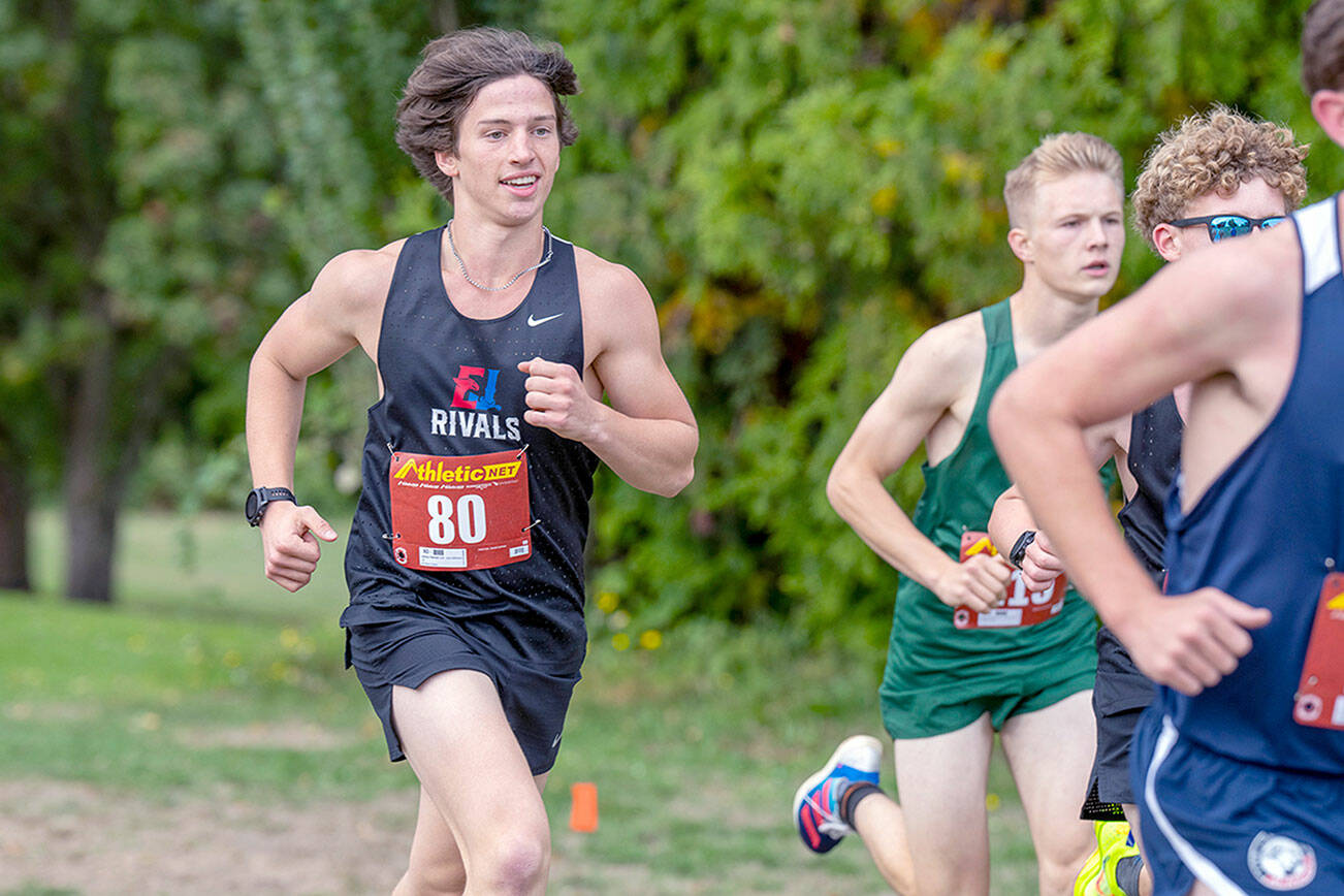 Steve Mullensky/for Peninsula Daily News

Port Townsend Rivals sophomore Josh Yearian, #80, looks relaxed as he runs up hill while competing in a multi-school cross country meet on Tuesday at Camus Prairie Park Golf Club. Yearian clocked a time of 10:38.50 for the two mile lap around the course.