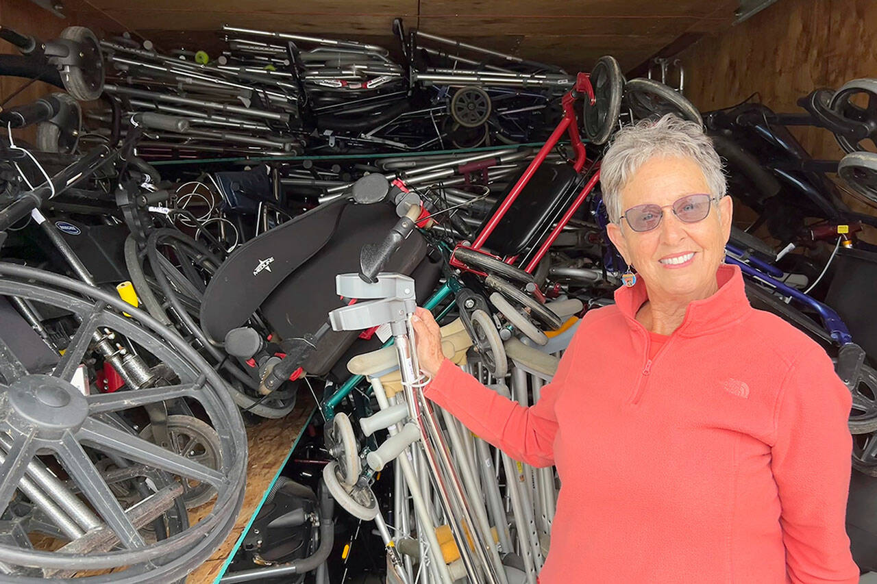 Rosalie DiMaggio looks to bring in at least another 40 wheelchairs to total about 150 and ship them along with walkers, canes and other medical gear to Guatemala to help people with mobility challenges. (Matthew Nash/Olympic Peninsula News Group)