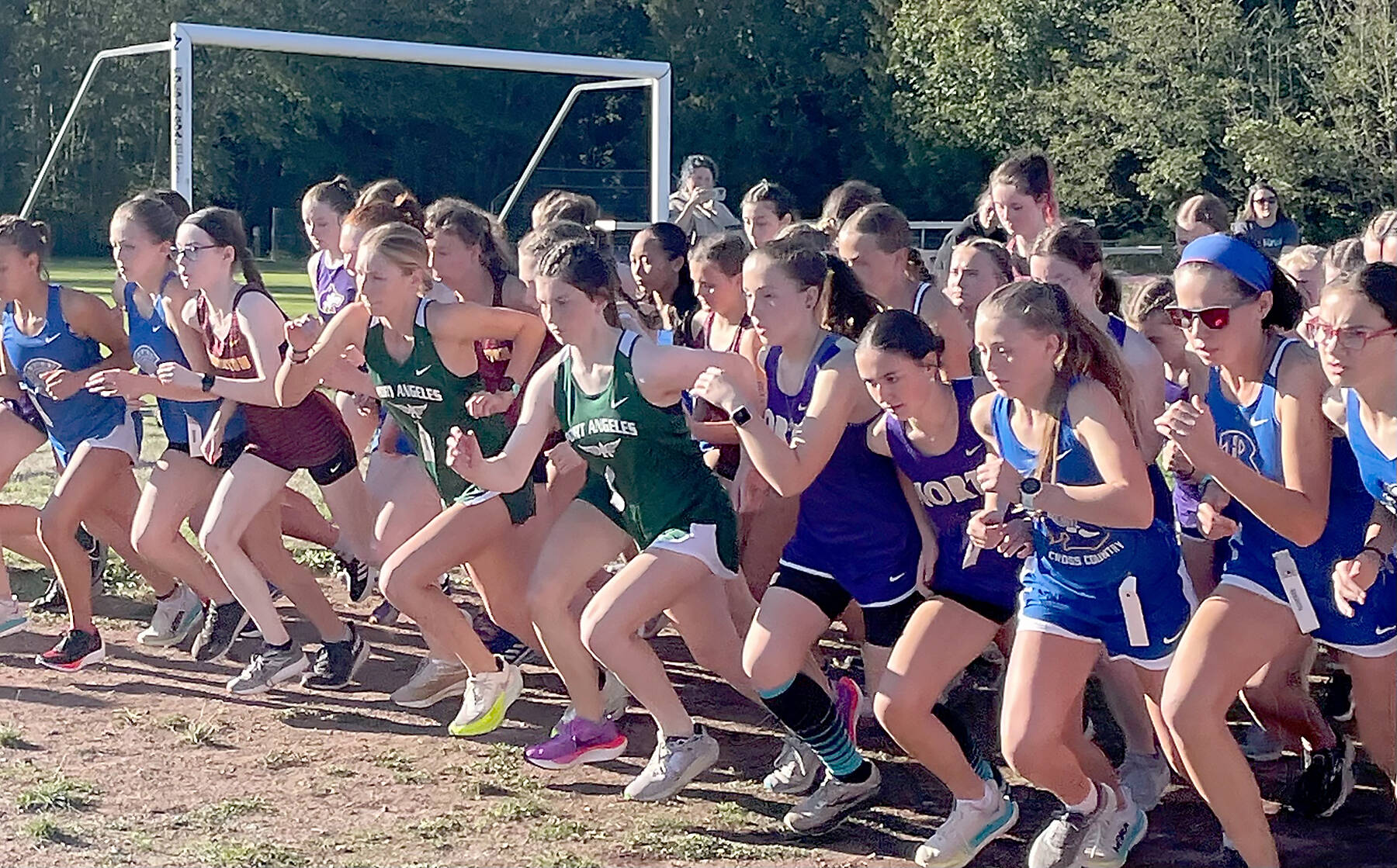 Port Angeles Cross Country 
Girls competitors begin the Olympic League Opener cross country race at Kingston High School on Wednesday.